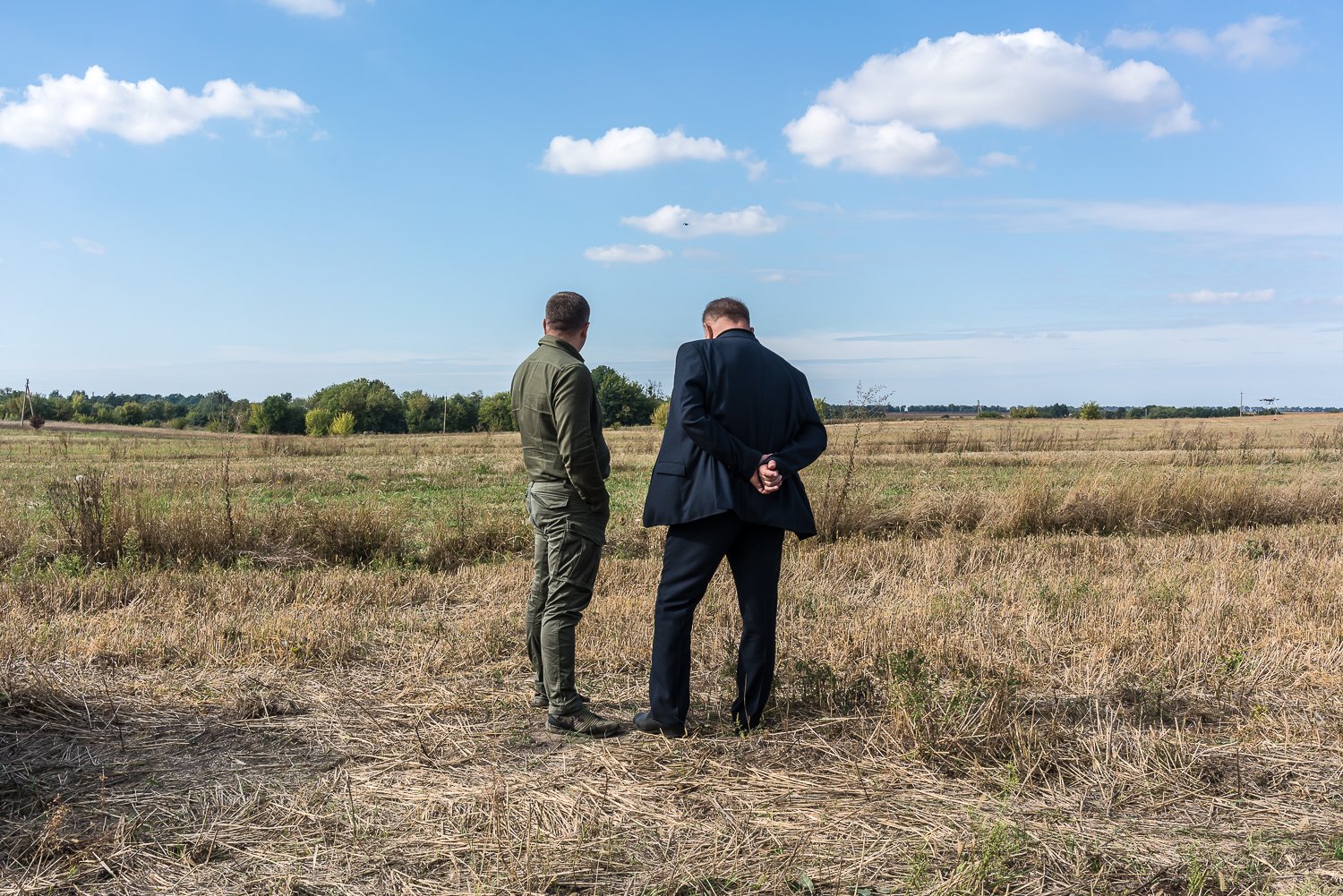  Men attend a demonstration of new demining technologies using drones on Wednesday, September 20, 2023 in Zhytomyr region, Ukraine. 