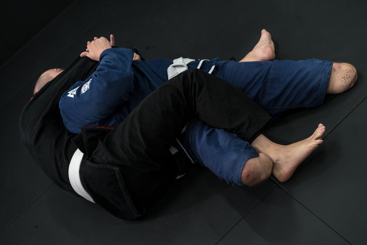  Vasyl Oksantiuk, 26, in blue, trains with Boroda, who could not give his name, during a Brazilian jiu jitsu class offered for free to Ukrainian military veterans at TMS Hub on Monday, October 9, 2023 in Kyiv, Ukraine. 