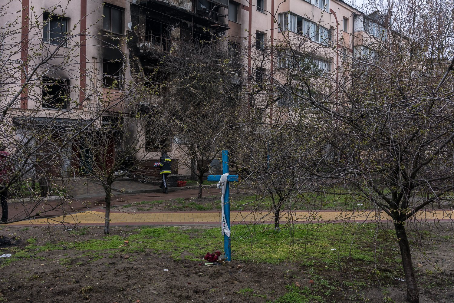  The site where Inna Leschenko, 45, who was killed by shelling in the city on March 19, was buried in a makeshift grave in the courtyard of her apartment building, on Friday, April 22, 2022 in Bucha, Ukraine. 