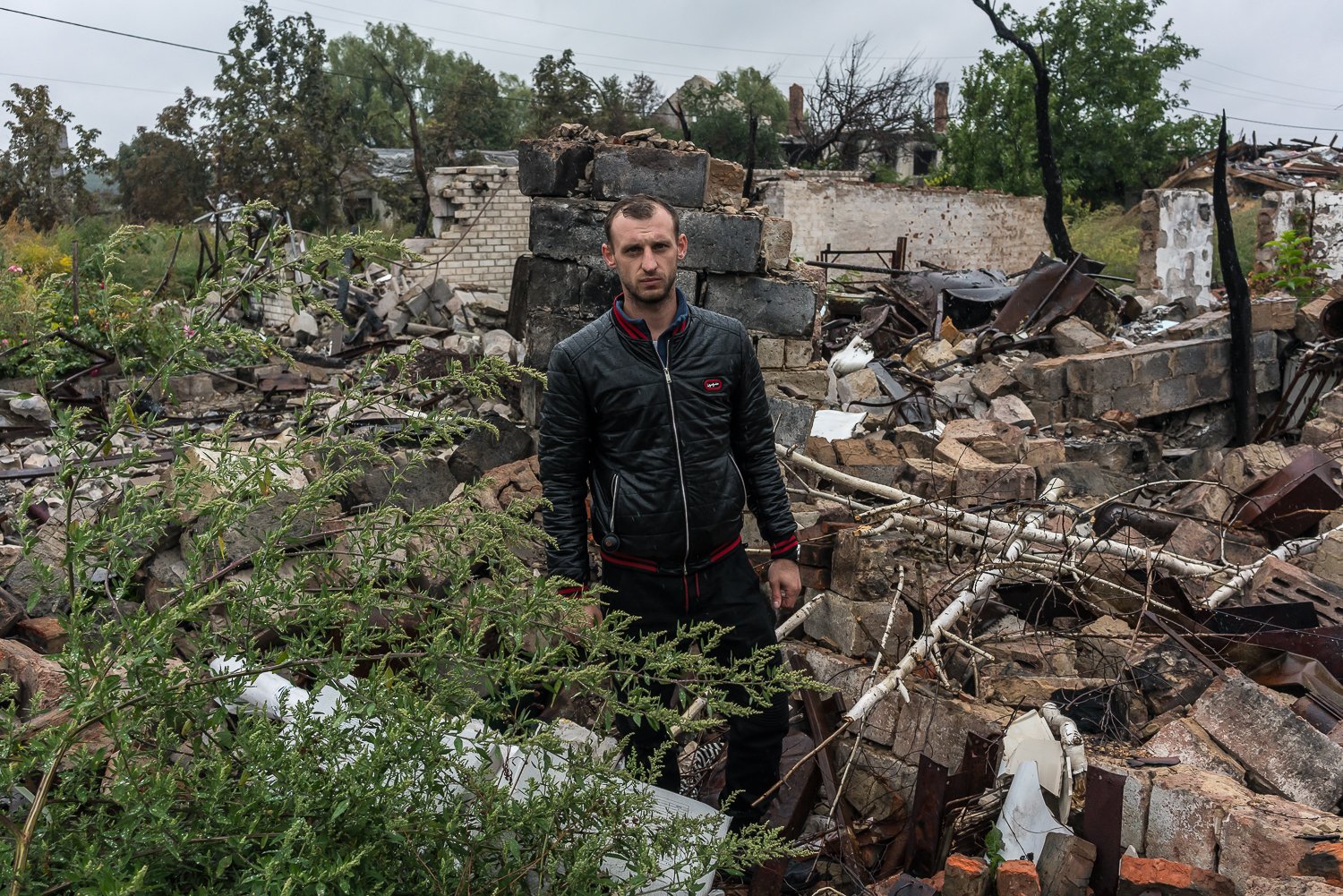  Oleksandr Bordey, one of the founders of the “Good Evening We’re From Ukraine” charity fund, poses for a portrait in a neighborhood that was heavily damaged by fighting during the early weeks of the Russian invasion on Saturday, September 10, 2022 i