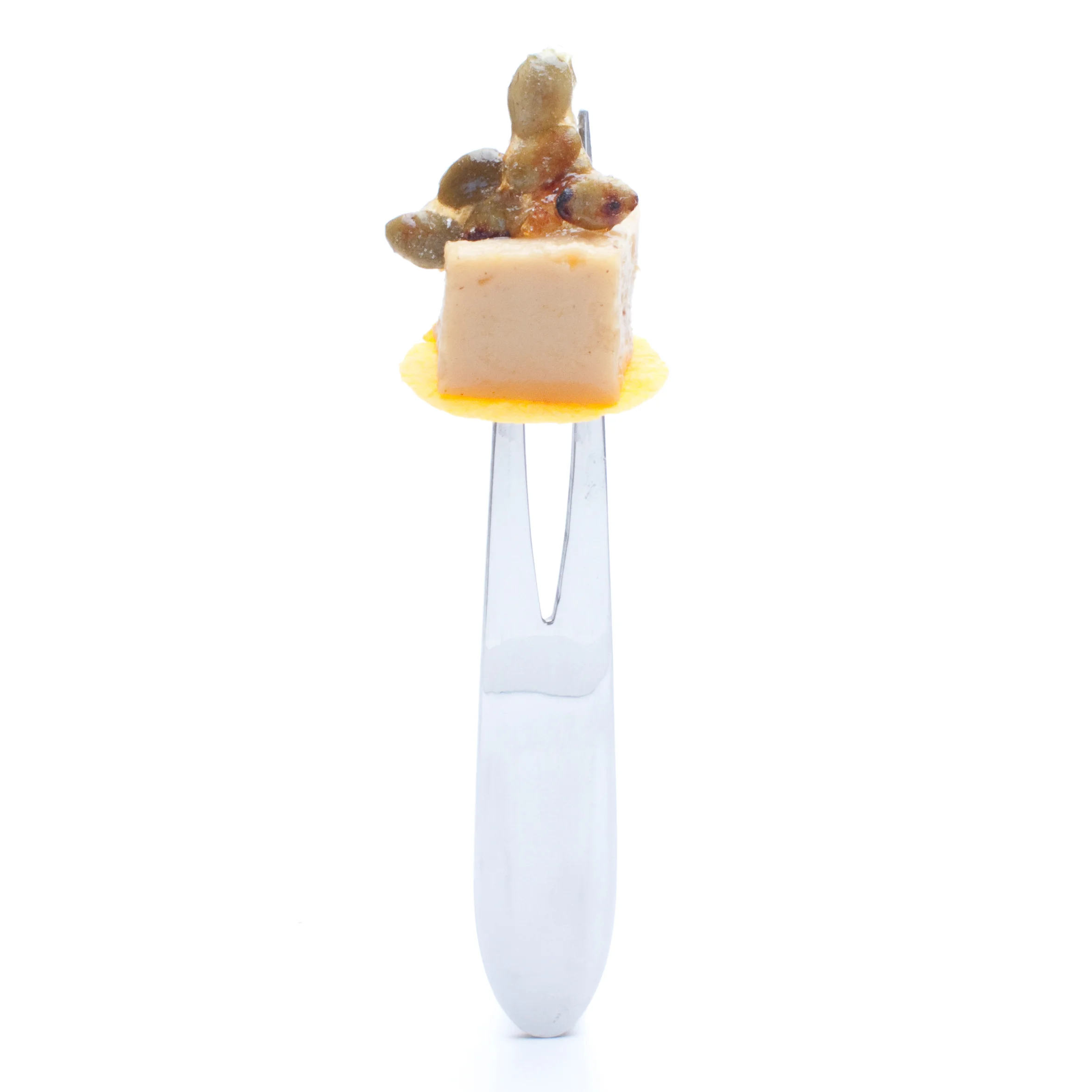 pinch fork™ 1. A custom-designed utensil with two prongs; used for serving several layers of food without compromising the integrity of each individual ingredient. 2. An ingenious way to display a perfect forkful of flavor.