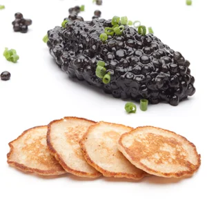 shar·ing 1. A deliberate mingling aid in which an obviously incomplete component of a recognizable finger food is served to one guest while its complement is served to another guest. 2. A great incentive to socialize; an icebreaker, a conversation starter.