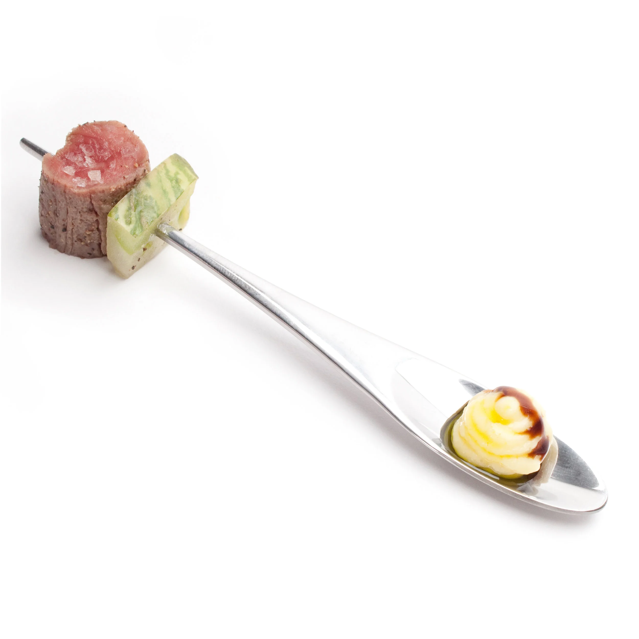 spin™ 1. A custom-designed utensil that combines the shallow bowl of a spoon with the pin-like end of a skewer; allows guests to “spin” from a dry ingredient to a liquid or wet ingredient with confidence and ease.