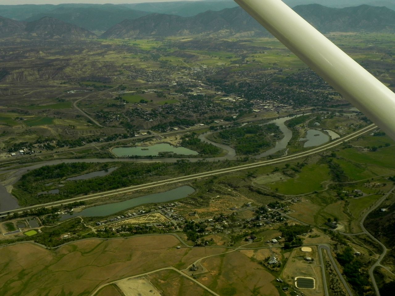 Lions Pond (on the far side of I-70 and the Colorado) from the air.
