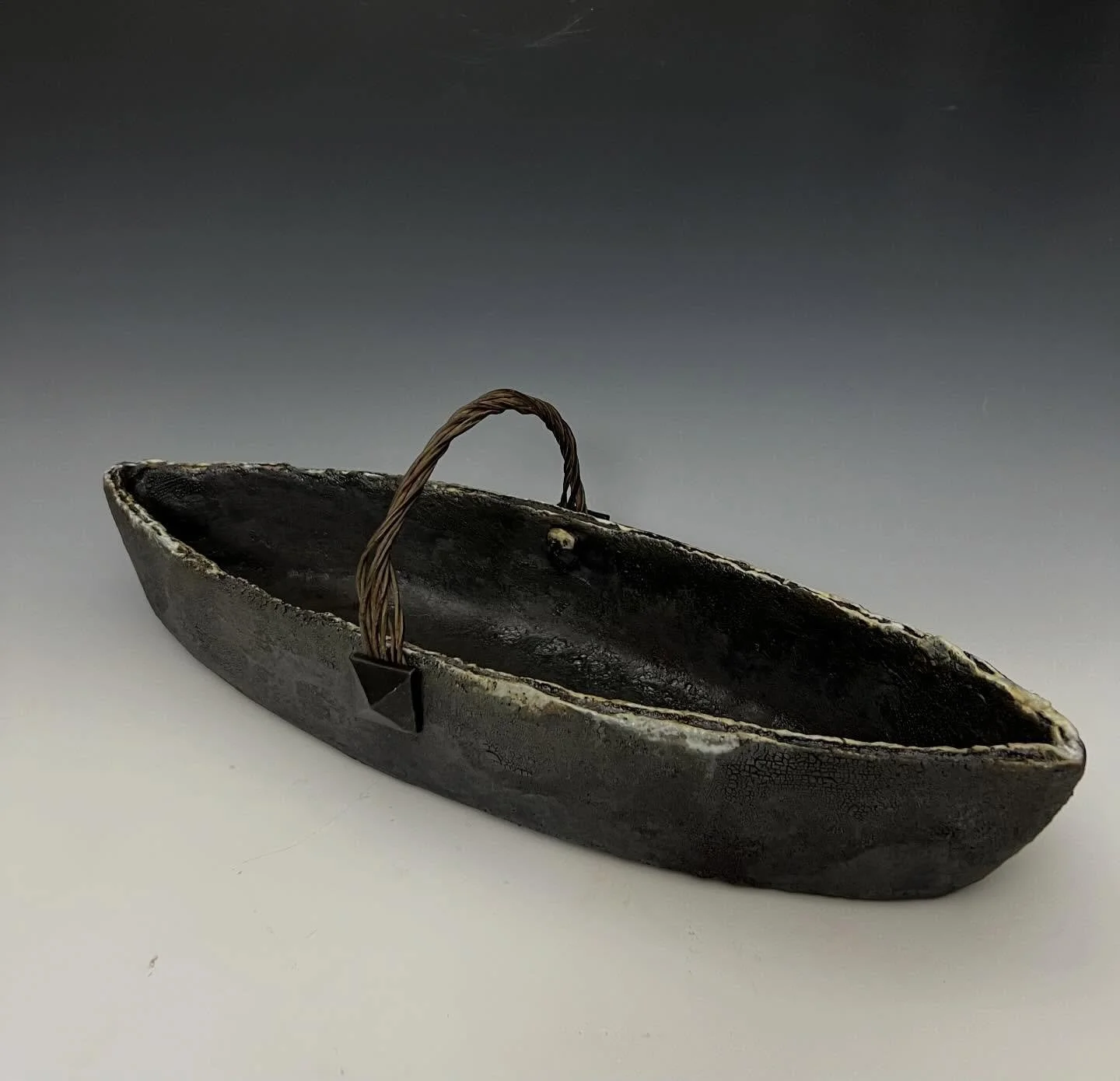 Doni-Langlois.com Stoneware basket with found metal handle. I&rsquo;m thinking breadsticks and Parmesan crisps could look pretty cool in there alongside your charcuterie?? 🤔💙link in bio