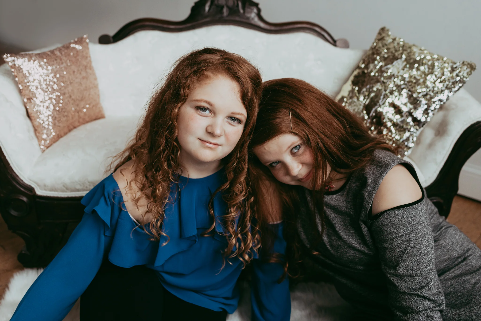 red haired girls in blue and gray sweaters - Lifestyle Family Photographer Minnetonka