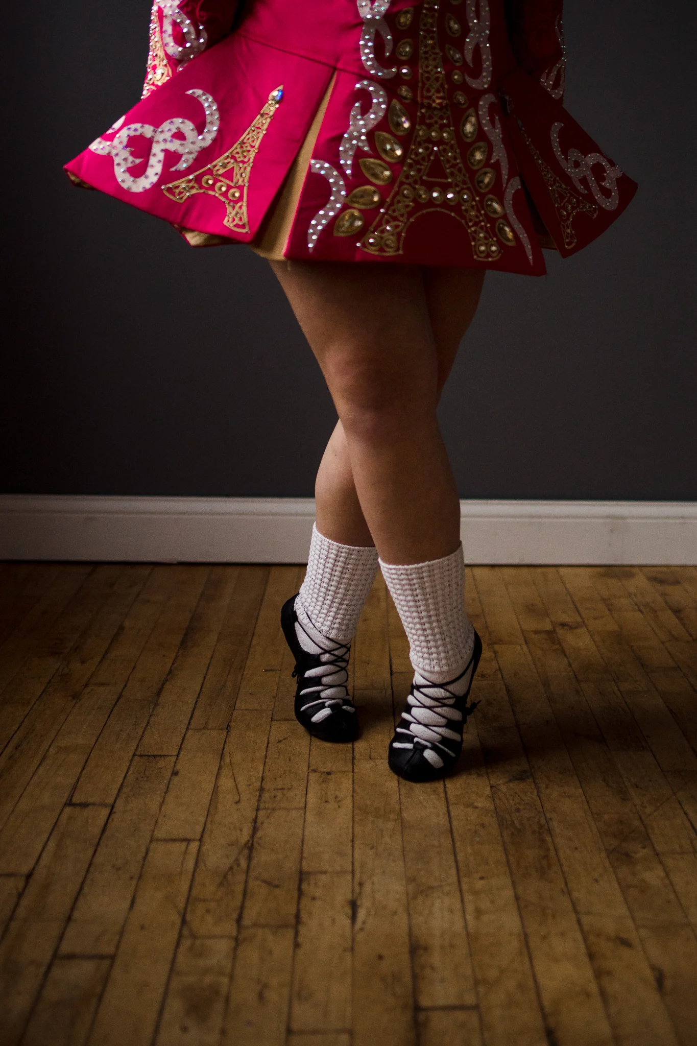 dark pink Irish Dance dress with white socks and black shoes - Wayzata Lifestyle Family Photographer