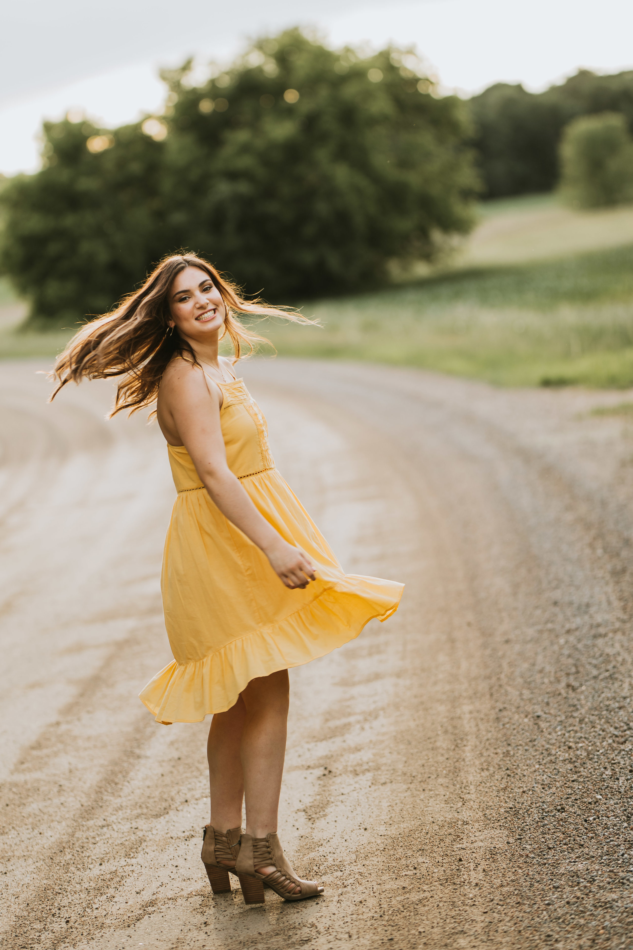 girl in yellow dress in the country