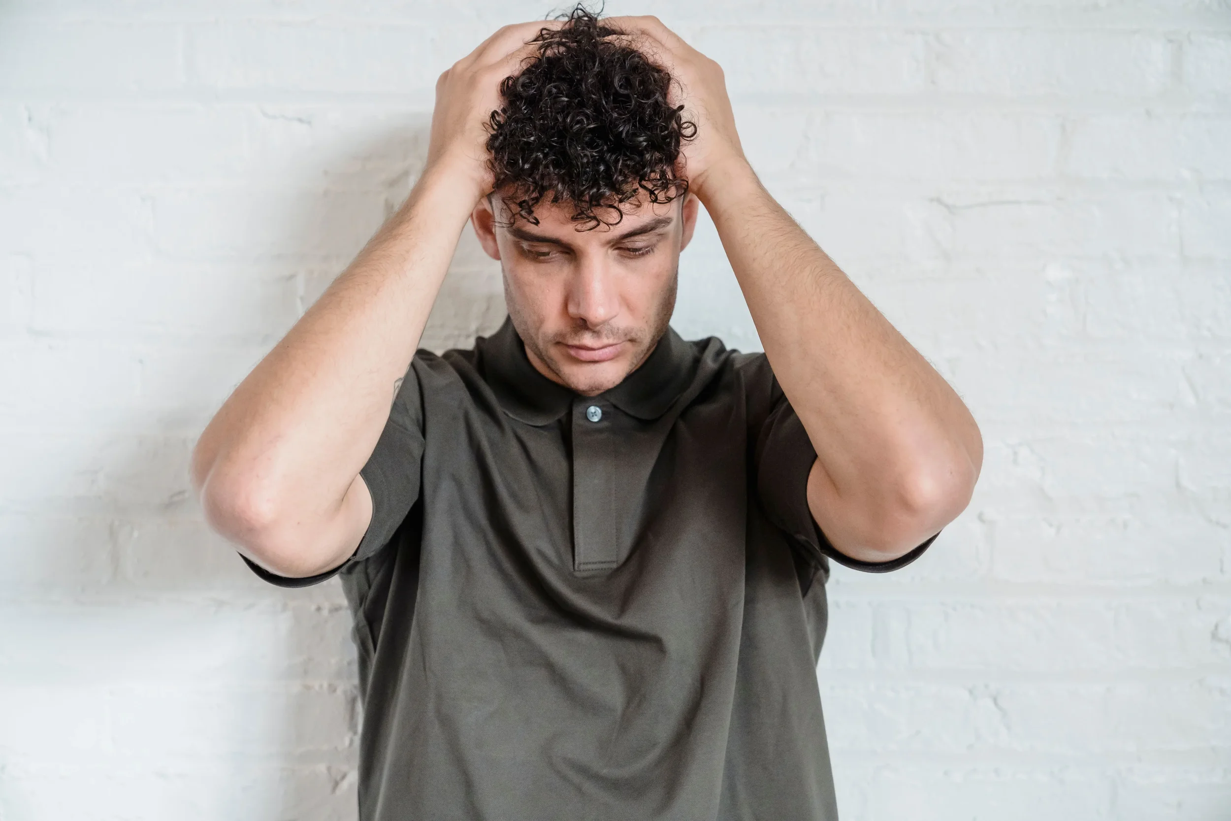 Man stress with head in hands