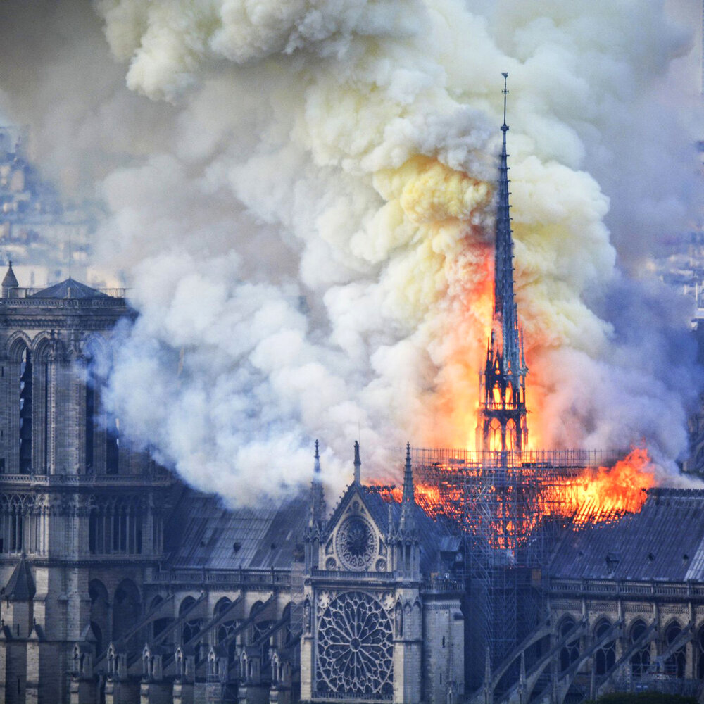  Smoke and flames rise during a fire at the landmark Notre Dame Cathedral in central Paris, France, on April 15, 2019. Hubert Hitier/AFP/Getty Images 