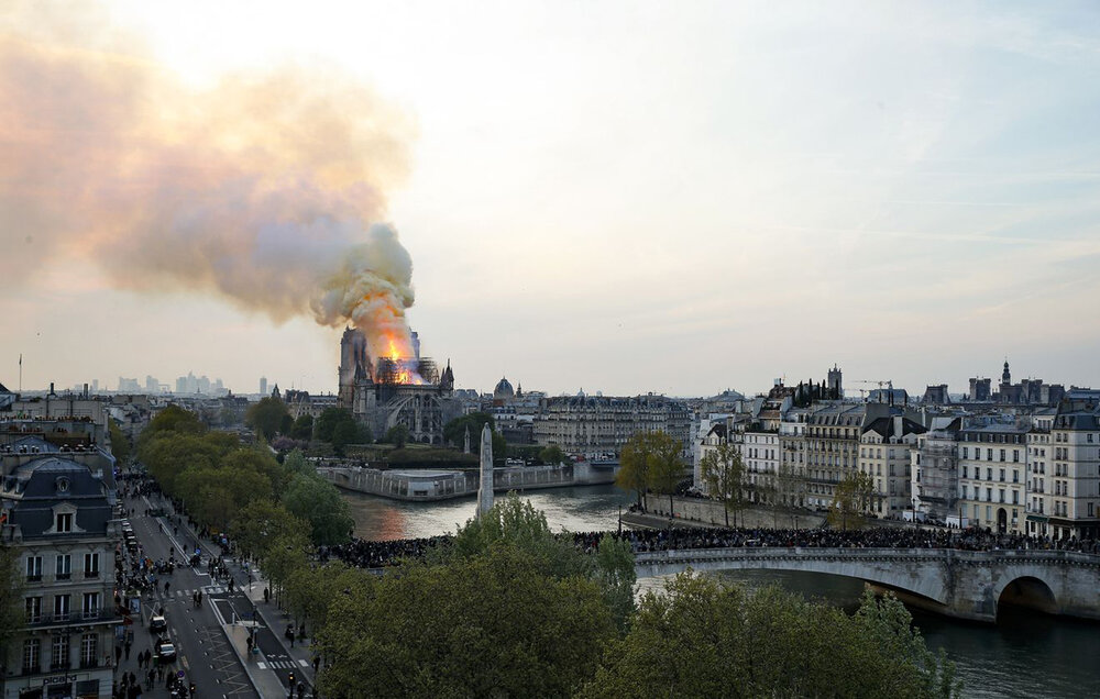  A view of the flames rising from Ile de la Cité in central Paris. Chesnot/Getty Images 