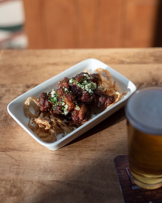 Wondering wtf the &quot;Burnt Ends&quot; on our new menu are? They're actually smoked pork belly cubes with a hot honey glaze, topped with blue cheese, fried onion, and chives.