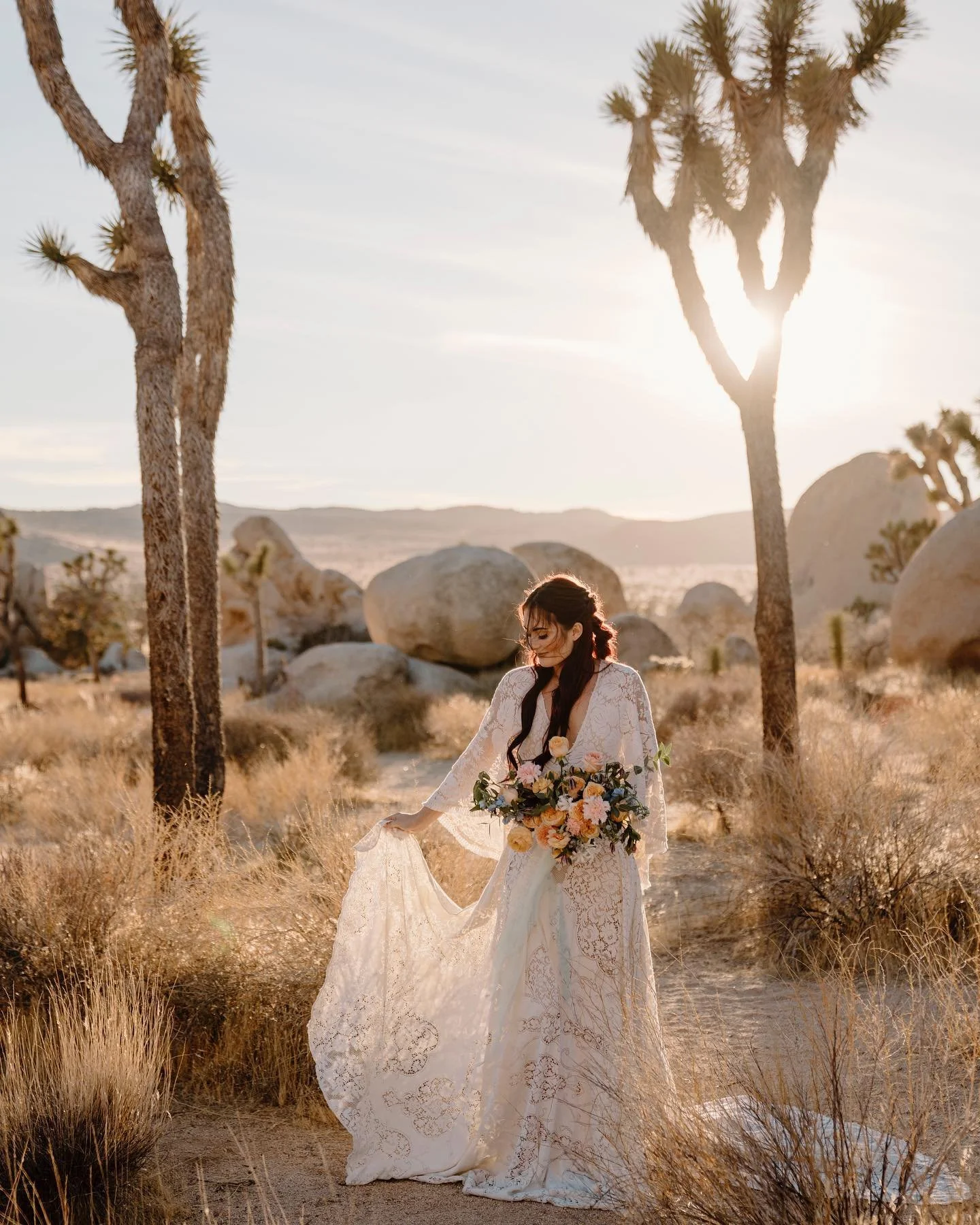 Joshua Tree elopements will always be a favorite 🖤

Planning &amp; Design: @rayanneroseweddings
Photography: @samraegenido
Furniture Rentals: @archiverentals @jennifermariefoxdesign 
Tabletop Rentals: @rusticpeonyco
Florist: @the_velvet_poppy
Charcu