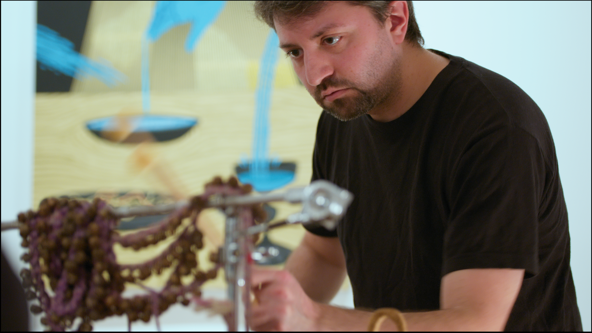 9. A close-up image of a percussionist playing various instruments.