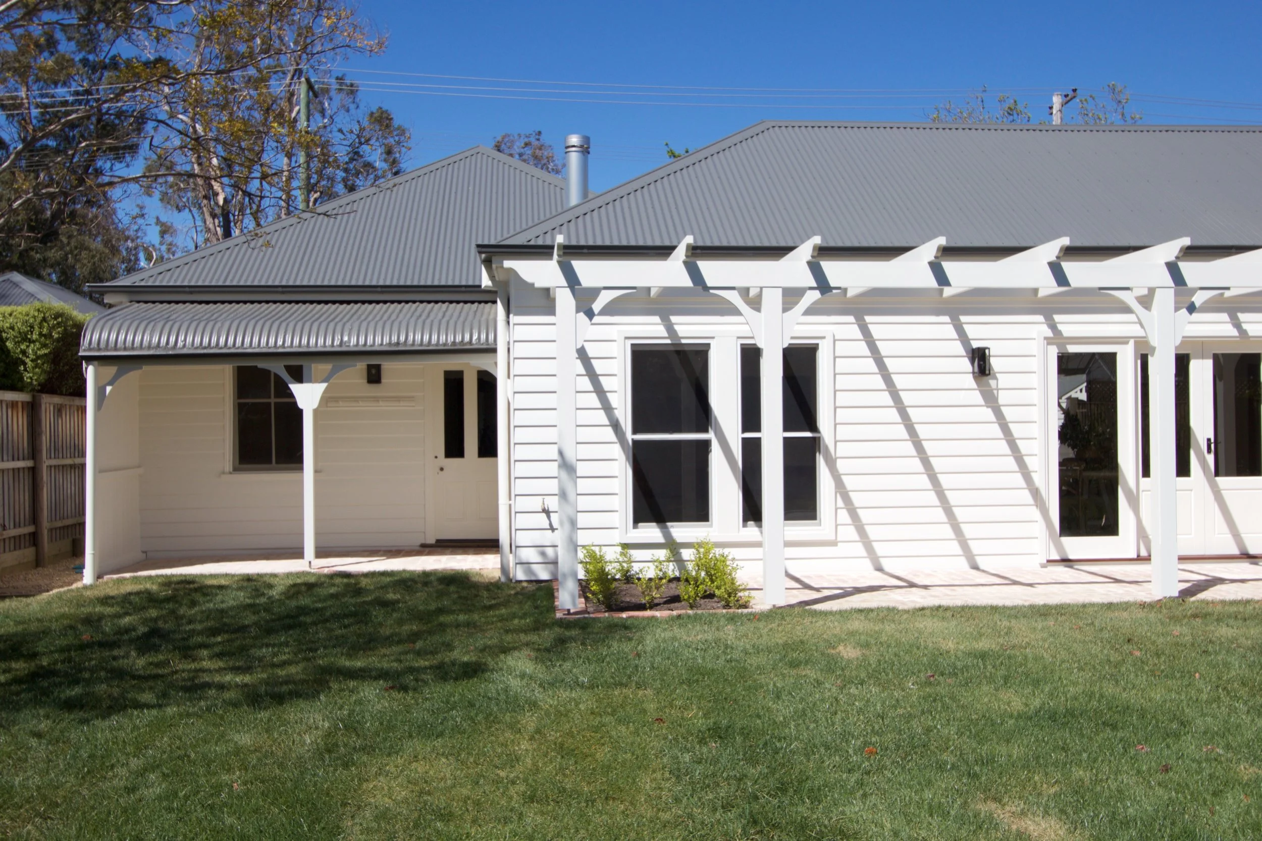 Link Between Original House and Garage to Create a New Living Space