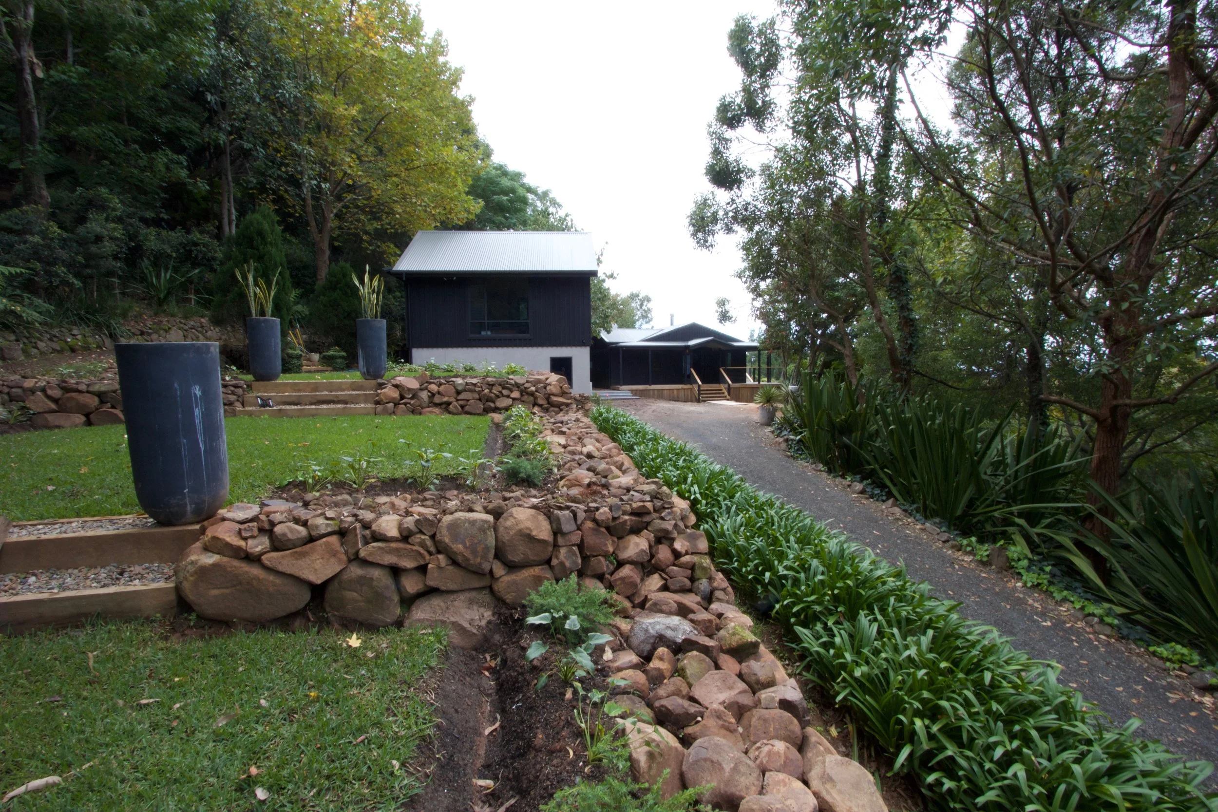 Extensive Paths, Stone Walls, Steps and Garden Beds