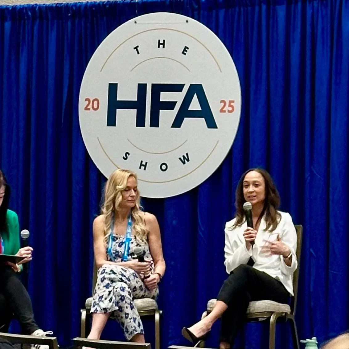 Ashley at a panel at the HFA show
