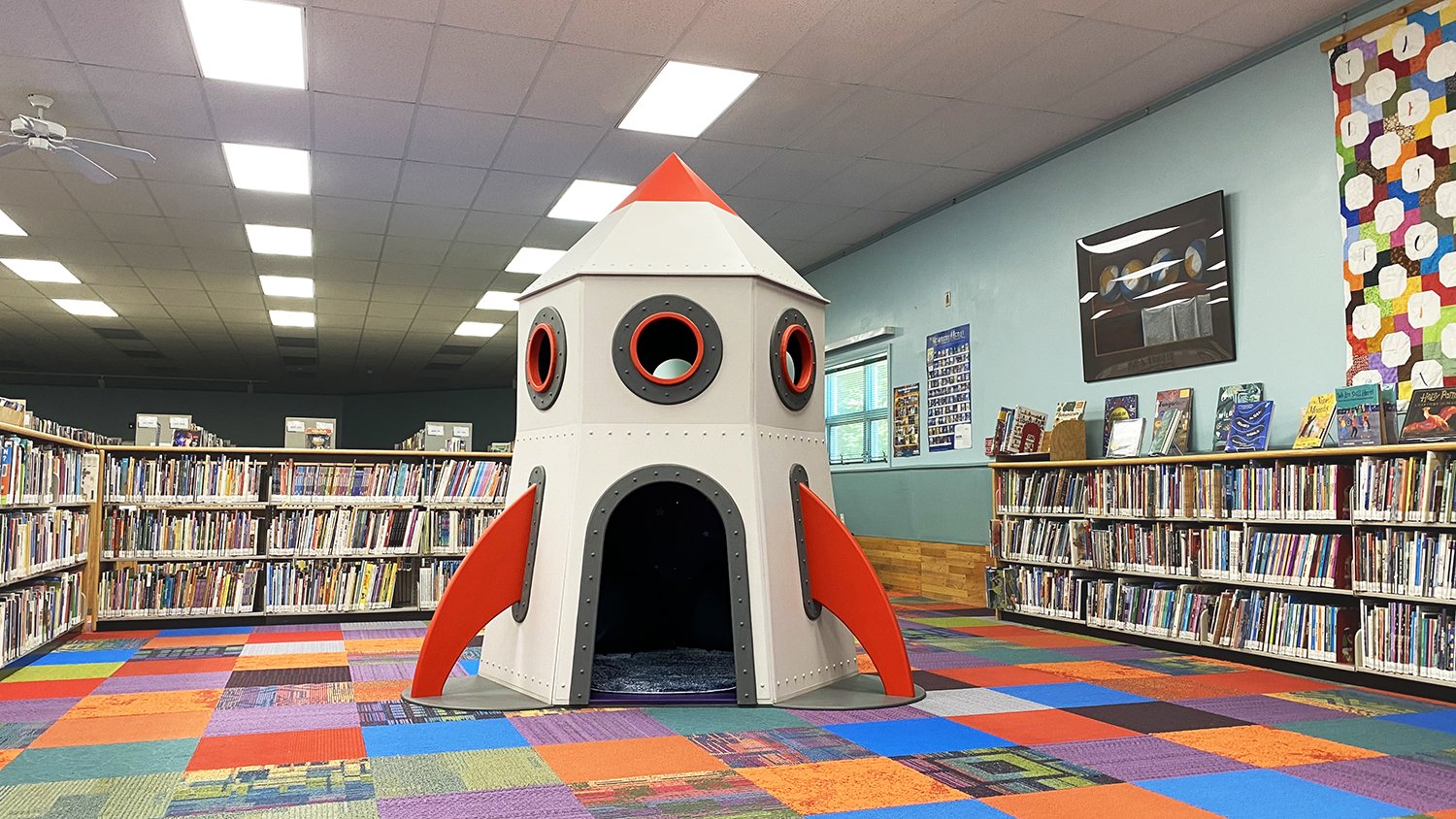 rusty lamer rocketship sculpture.jpg