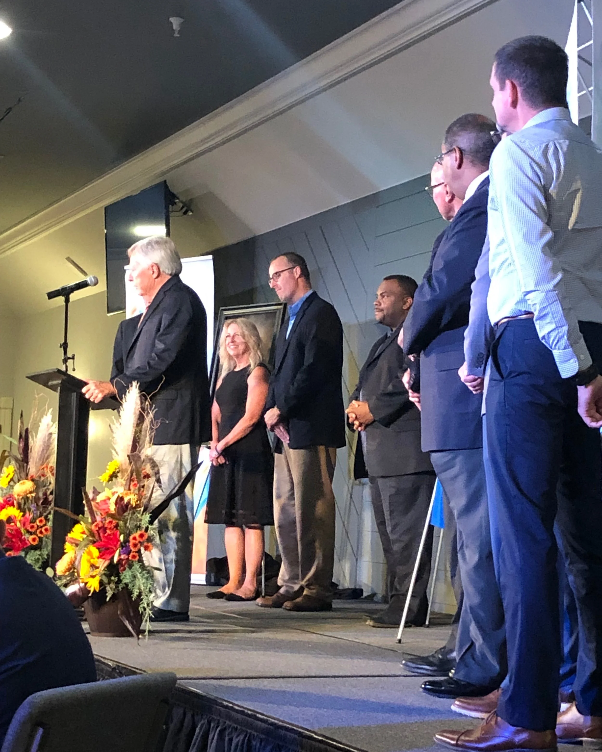 The Servant Solutions Board of Trustees present a retirement gift.