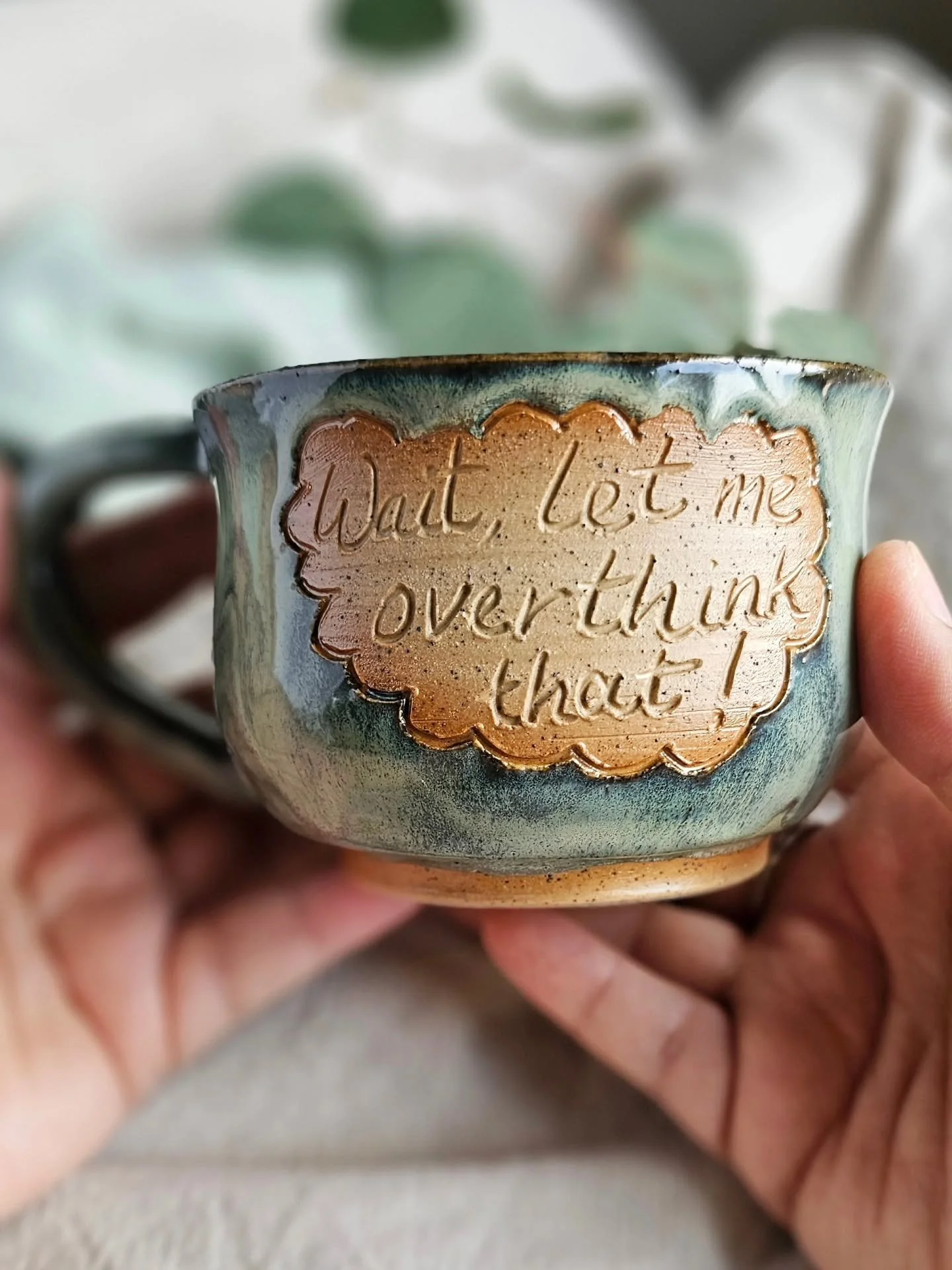 Fresh Smug Mugs &mdash; sanded, washed, and packed, all ready for delivery&hellip; and I have a favourite. 

This one right here, dressed in my signature Petrichor glaze (all mossy greens, rainy blues, and pure cosy-weather energy), says: &ldquo;Wait