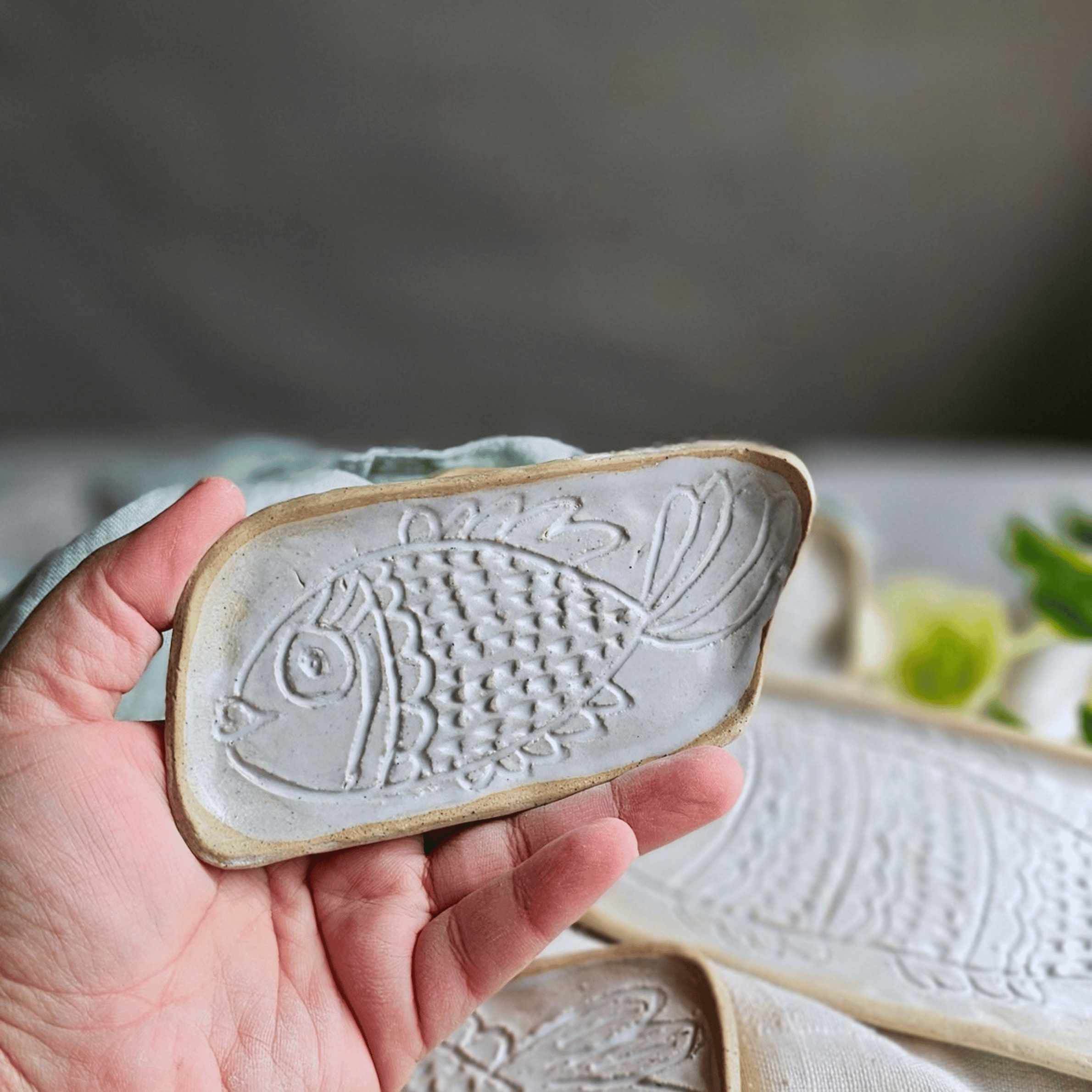 Just Keep Swimming_group_flatlay_small_in hand.png
