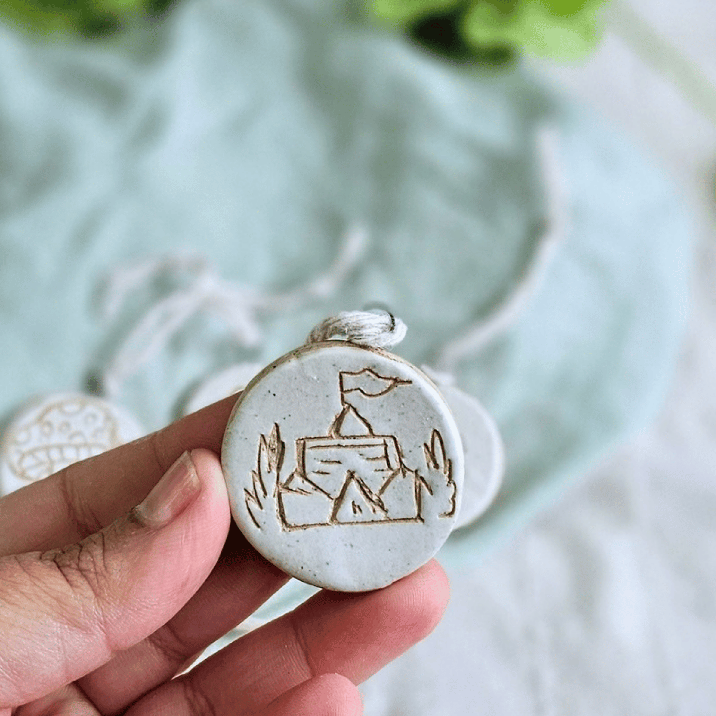 Mini Ornaments_sgraffito_white glaze_flag.png