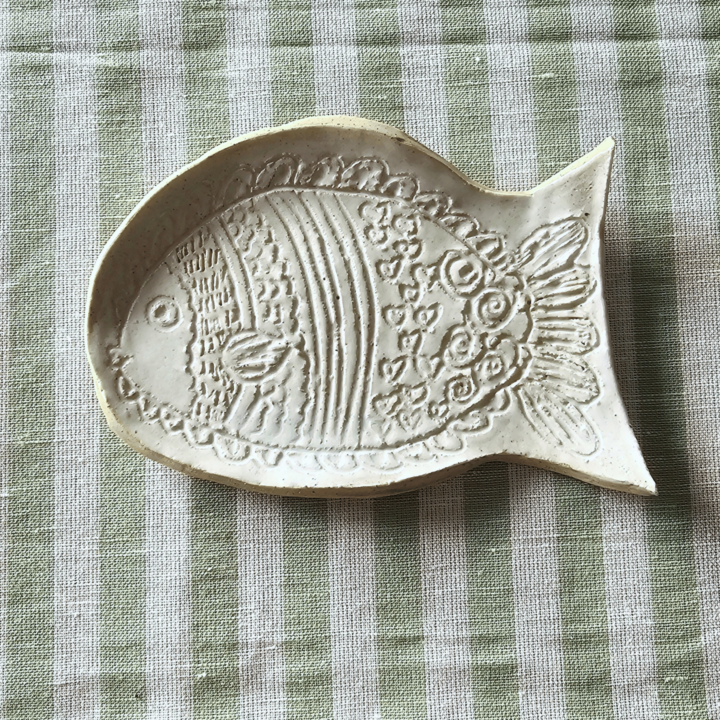 Just Keep Swimming_group_flatlay_curved trays_linned fish.png