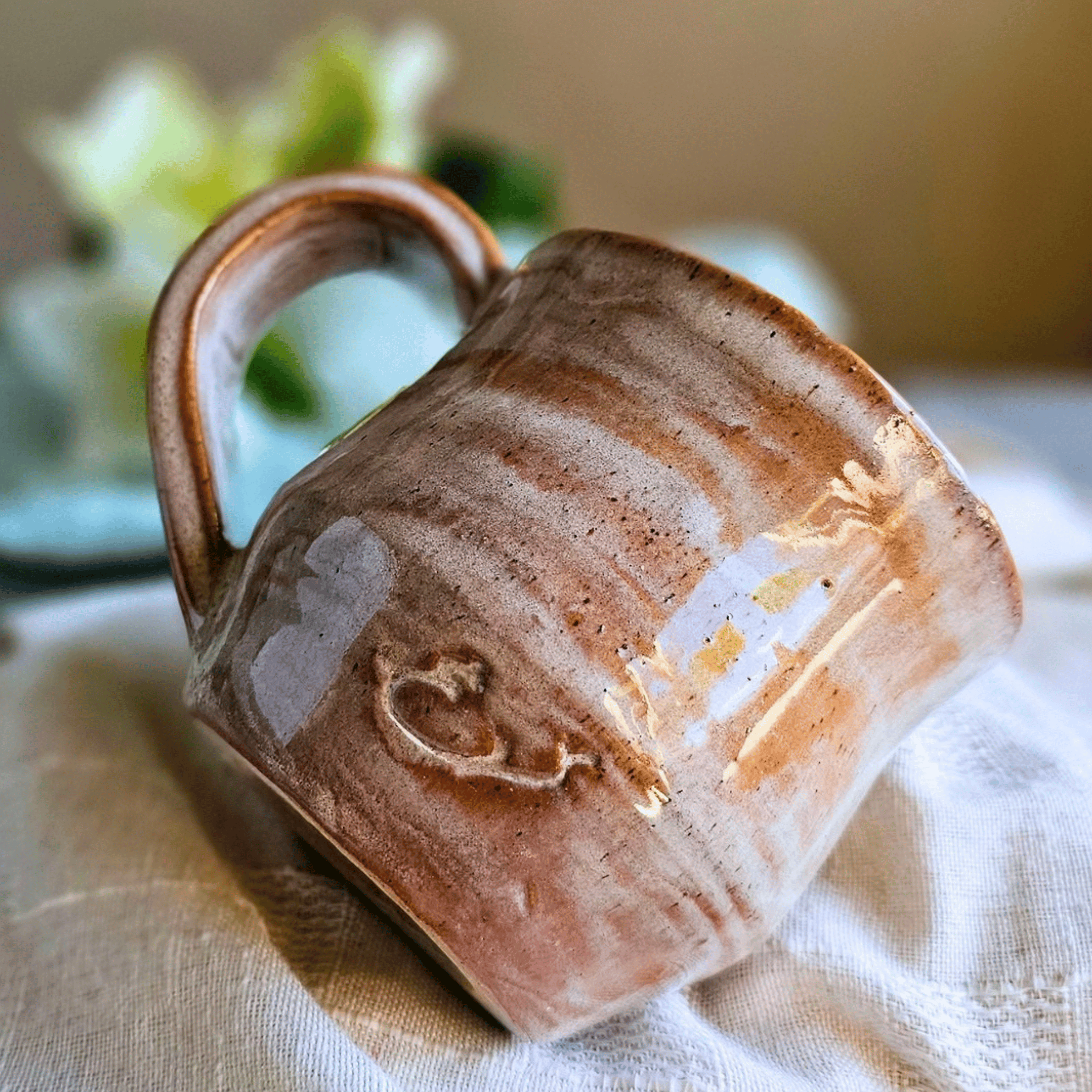 Smug Mug_handled_hand carved_female lead_back.png