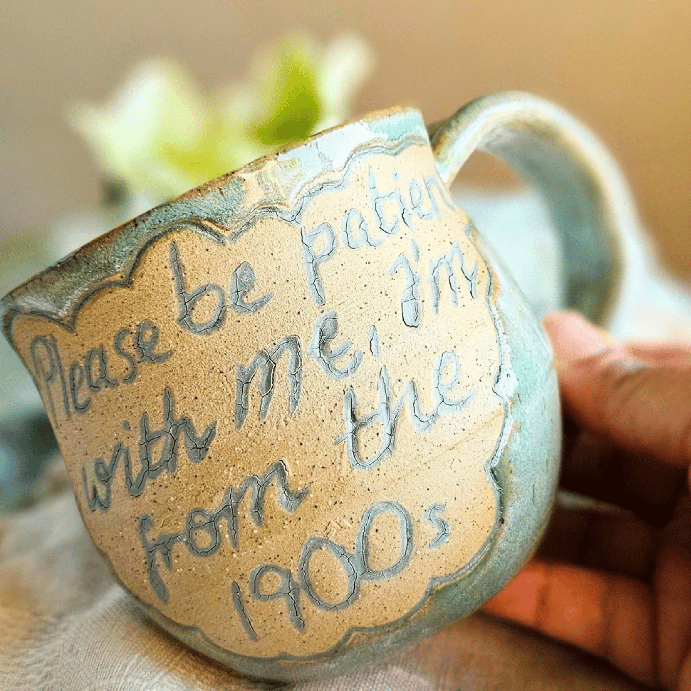 Smug Mug_handled_hand carved_1900s_in hand_front.png