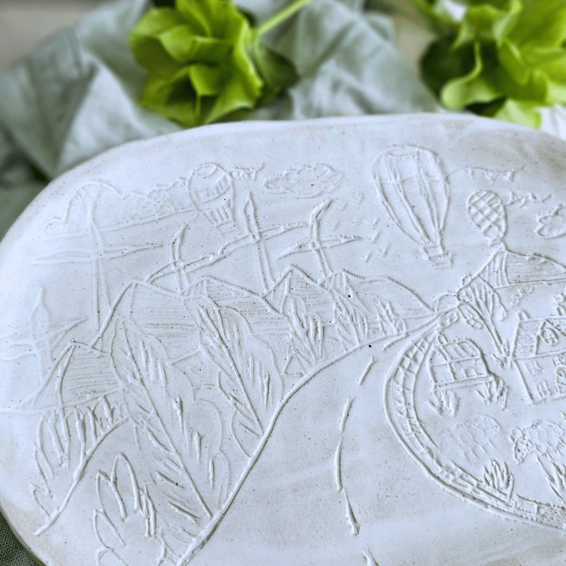 Valley Board_white glaze_sgraffito_close up_left.png