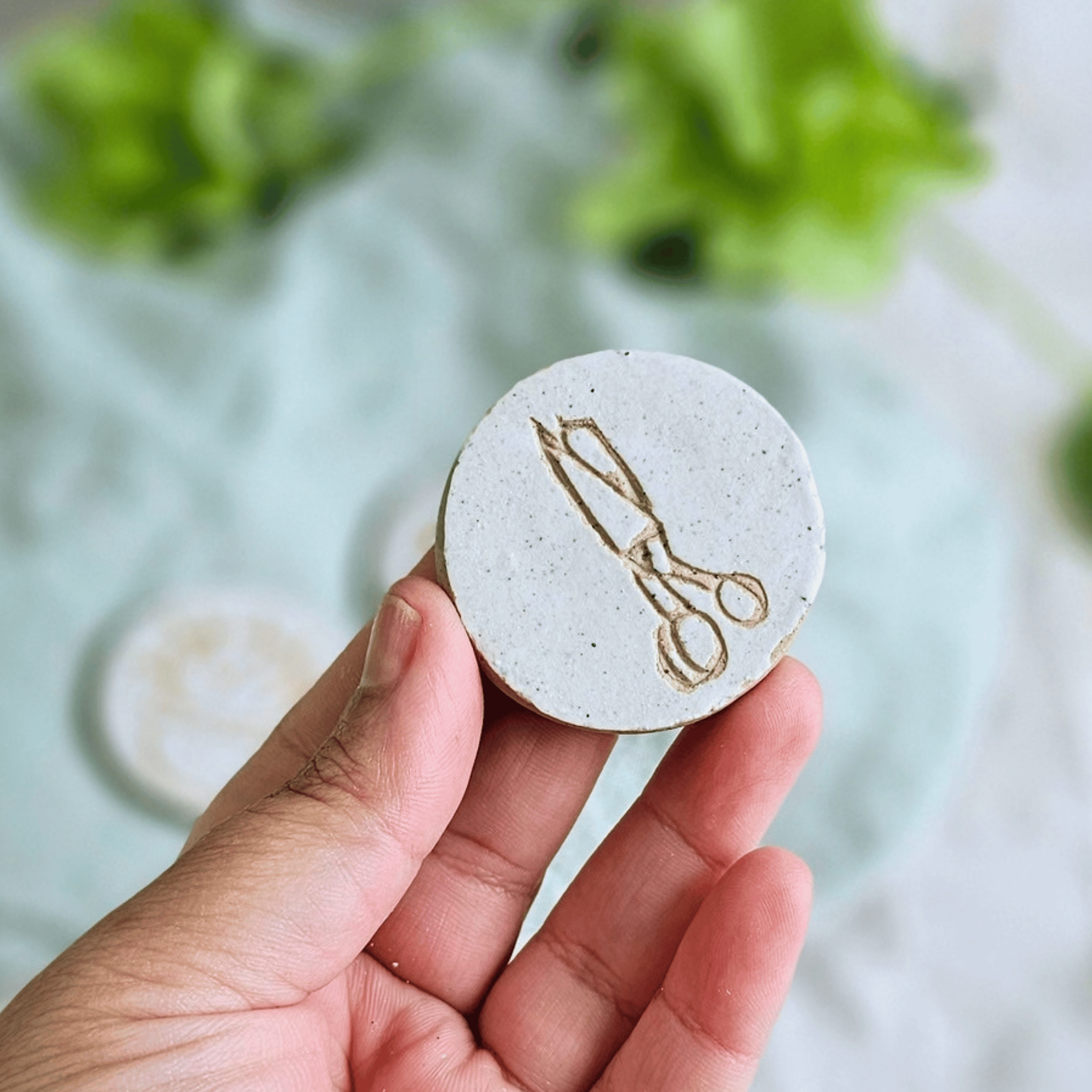 Pattern Weights_sgraffito_white glaze_scissors.png