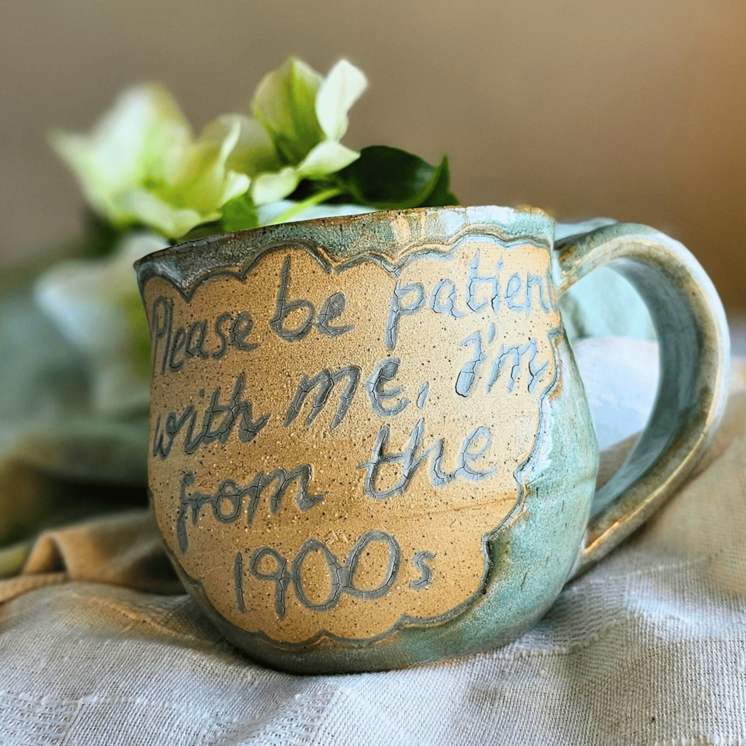 Smug Mug_handled_hand carved_1900s_front.png