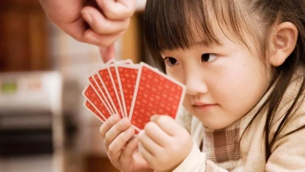 girl with cards.jpg