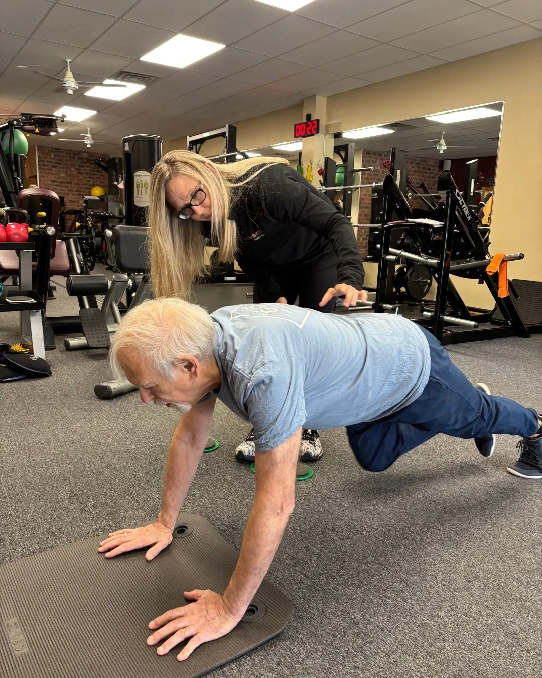 Are you staying engaged during your core work? 
It's easy to try to just endure- or get it done- which is where your trainer comes in. Here Personal Trainer Dani is giving client Rich direct feedback to help him stay more engaged and get more out of
