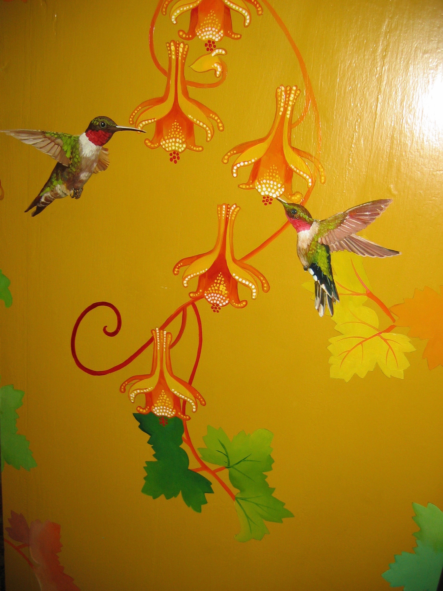 hummingbird detail on cabinet