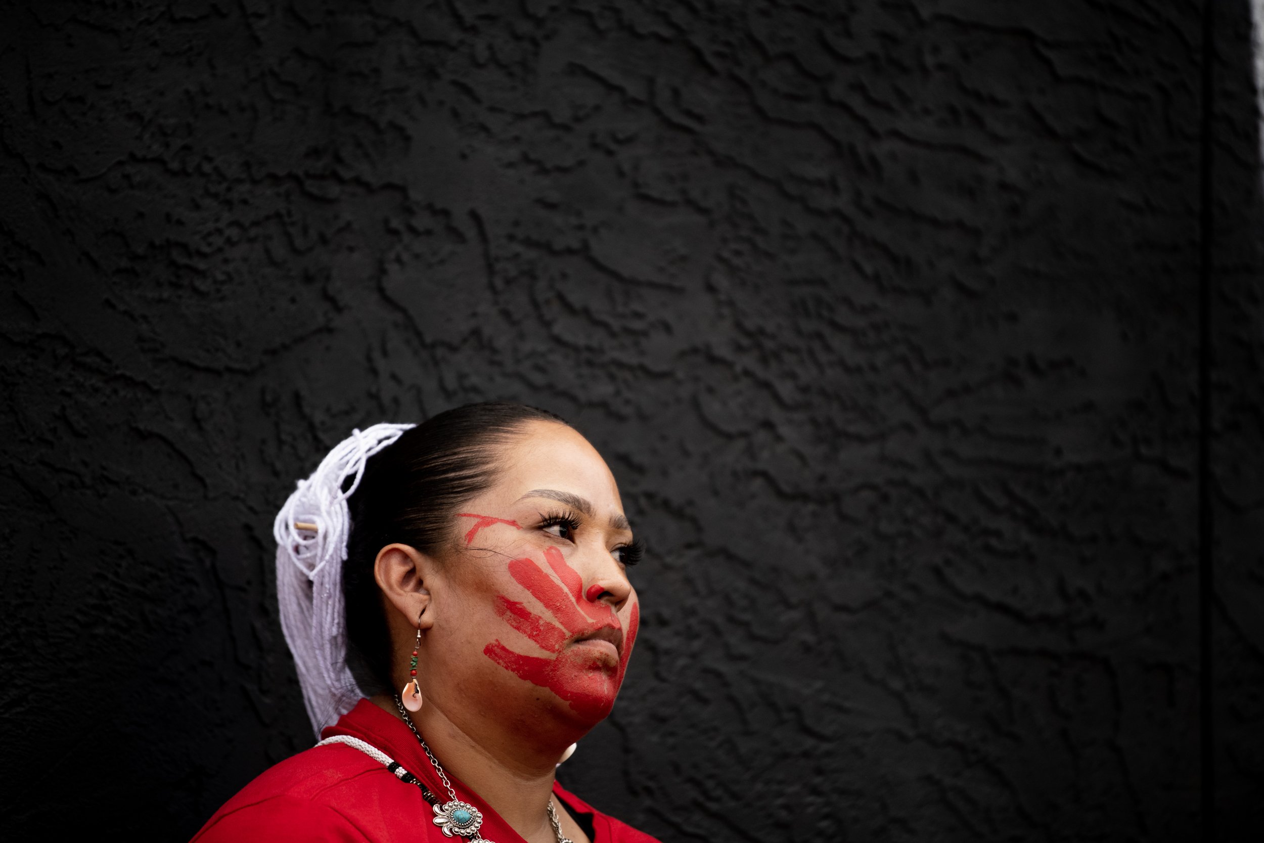  Jalen Dinae listens to speakers during the National Day of Awareness for Murdered and Missing Indigenous Relatives Rally on Friday, May 5, 2023, in downtown Colorado Springs, Colo.  