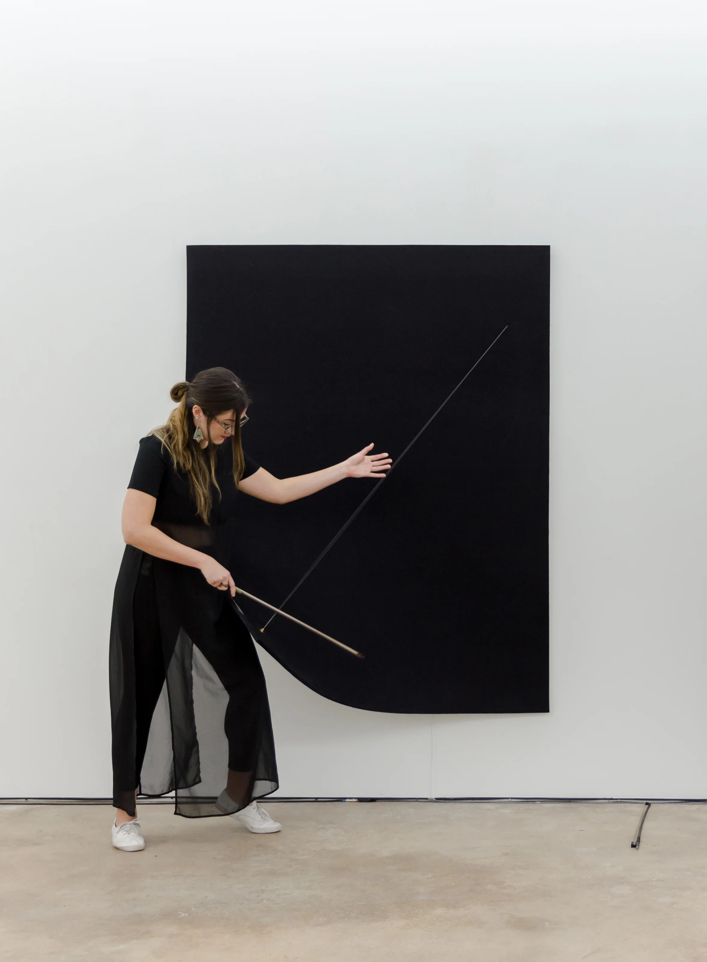 Naama Tsabar, Image from "Transitions #3" performance, 2016, Spinello Projects, Miami, Photo: Diana Larrea