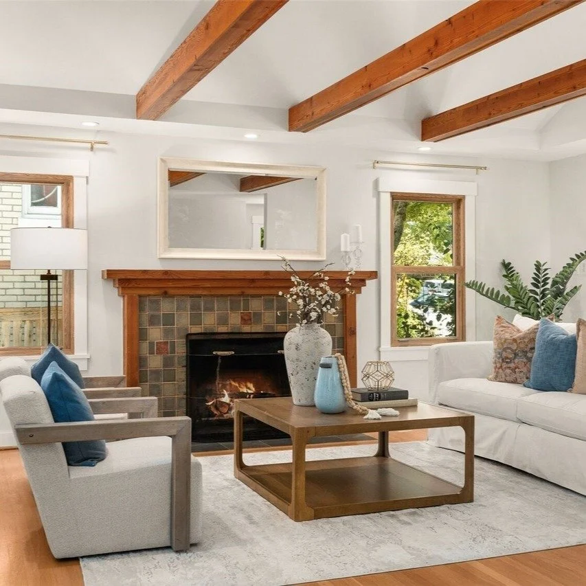 We love the brick and wood touches in this Queen Anne living room. So warm and welcoming! Listed by @kim_wesselman and @renejstern with @windermeremidtown. 

#queenanneseattle #staging #homestaging #stagingworks #architecture #homesweethome #livingro