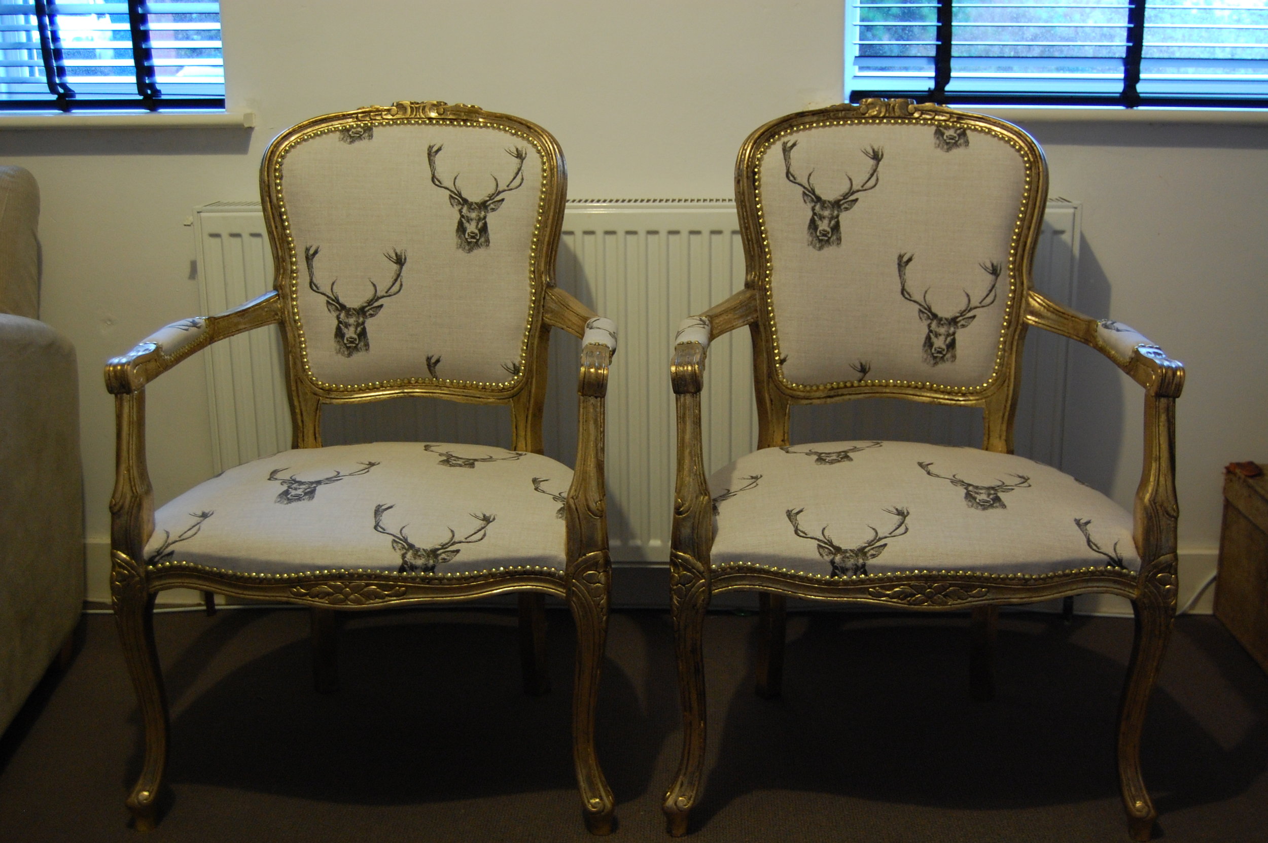 Grist & Twine Upholstery: Pair of reproduction salon chairs reupholstered in stag print fabric