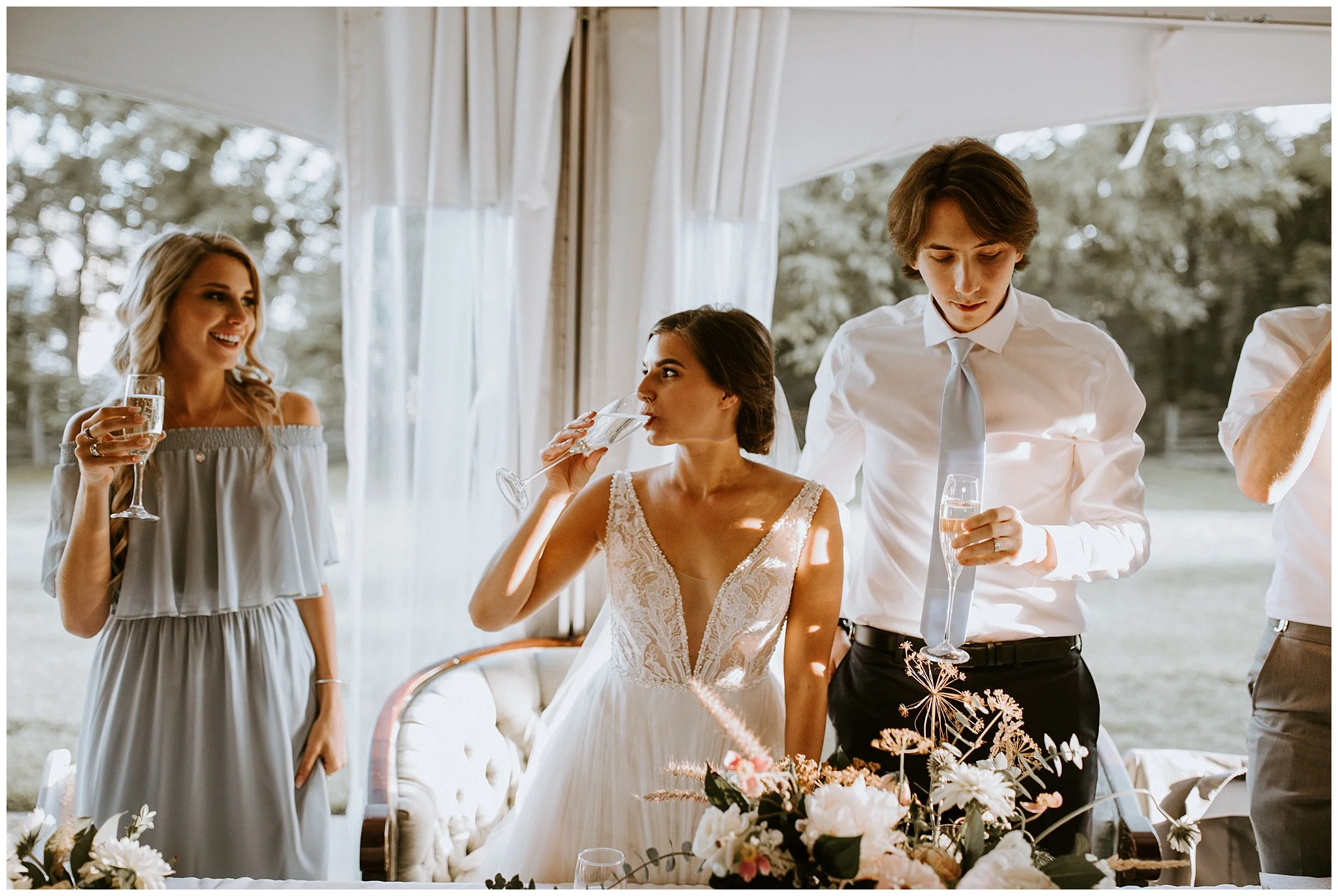 Bride and groom in the open tent reception at Estate 248