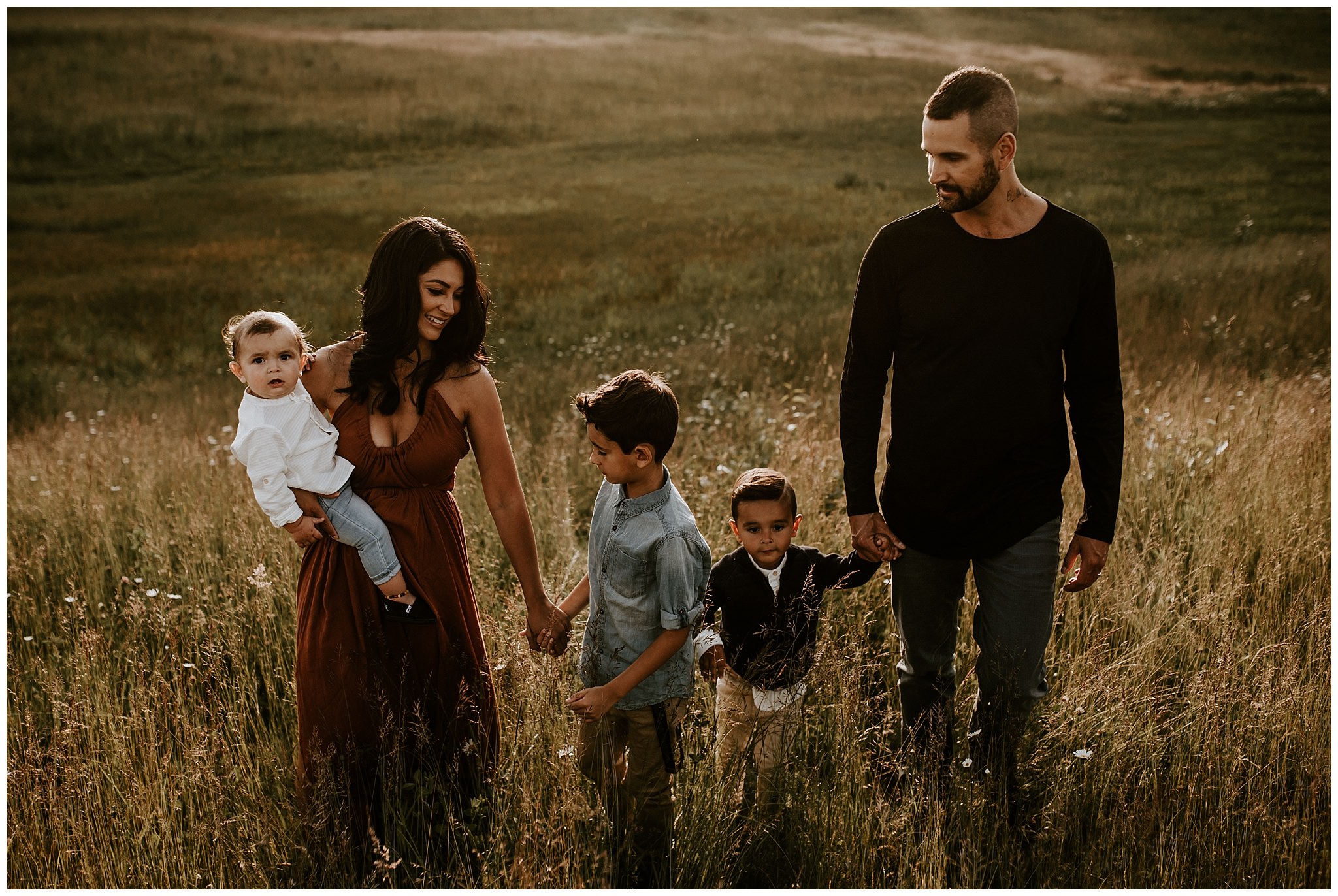 A candid and relaxed family photo during a summer session at Aldergrove Regional Park 