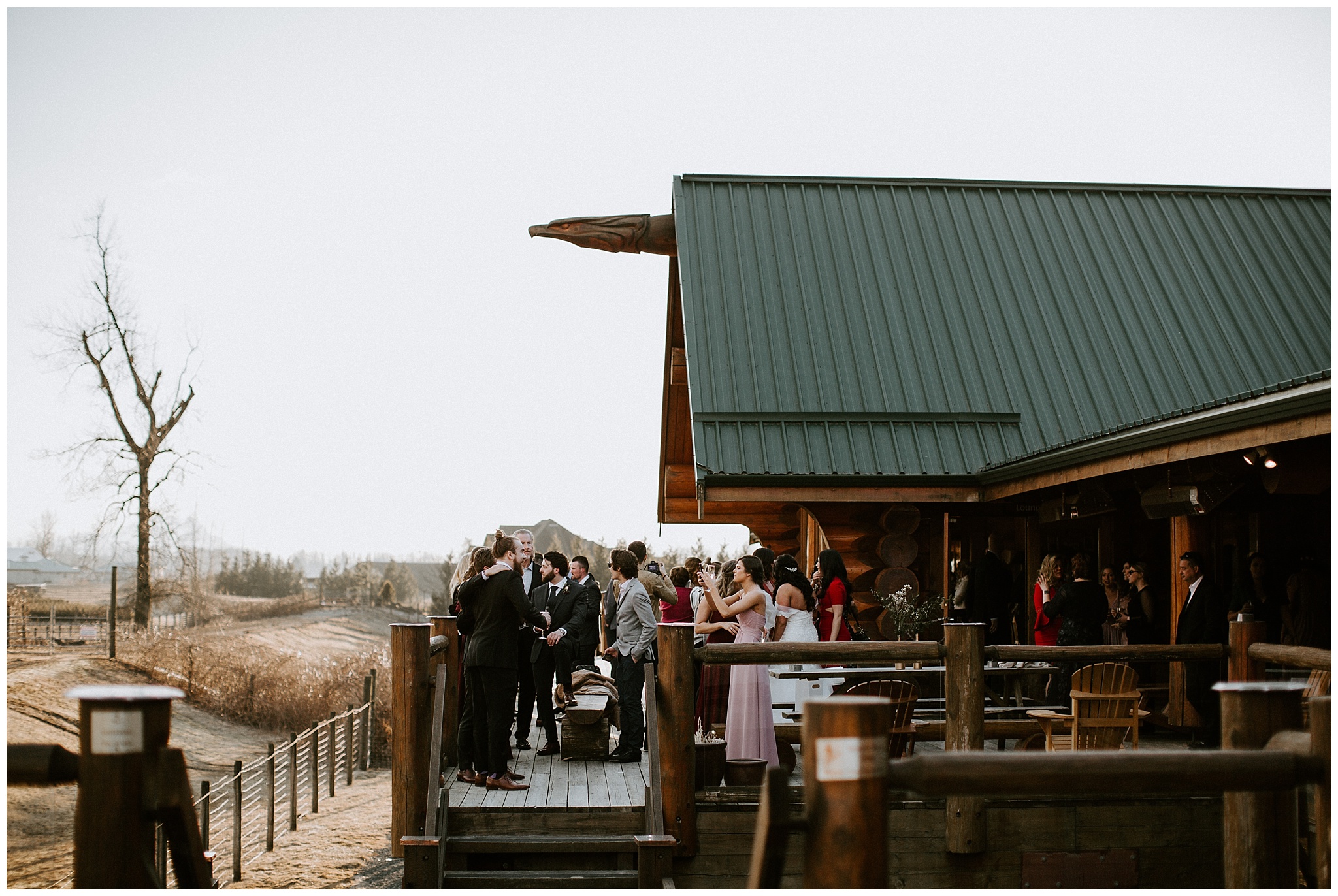  Wedding guests on the deck at the Fraser River Lodge. 