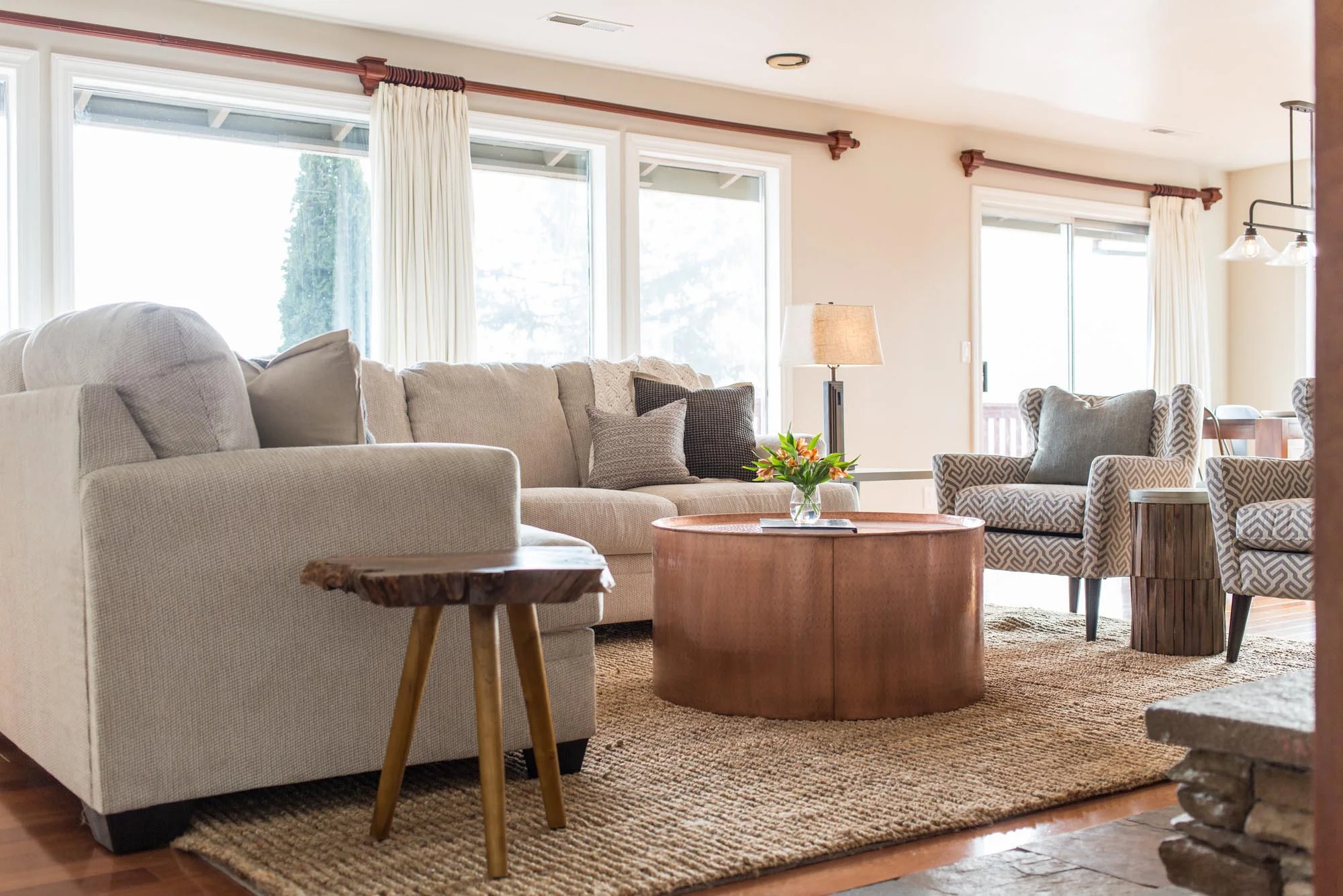 Comfortable living room space with sofas and soft chairs