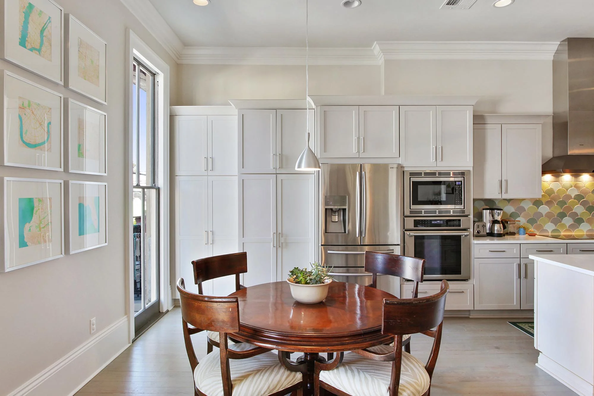 Polished wood breakfast table with seating for four