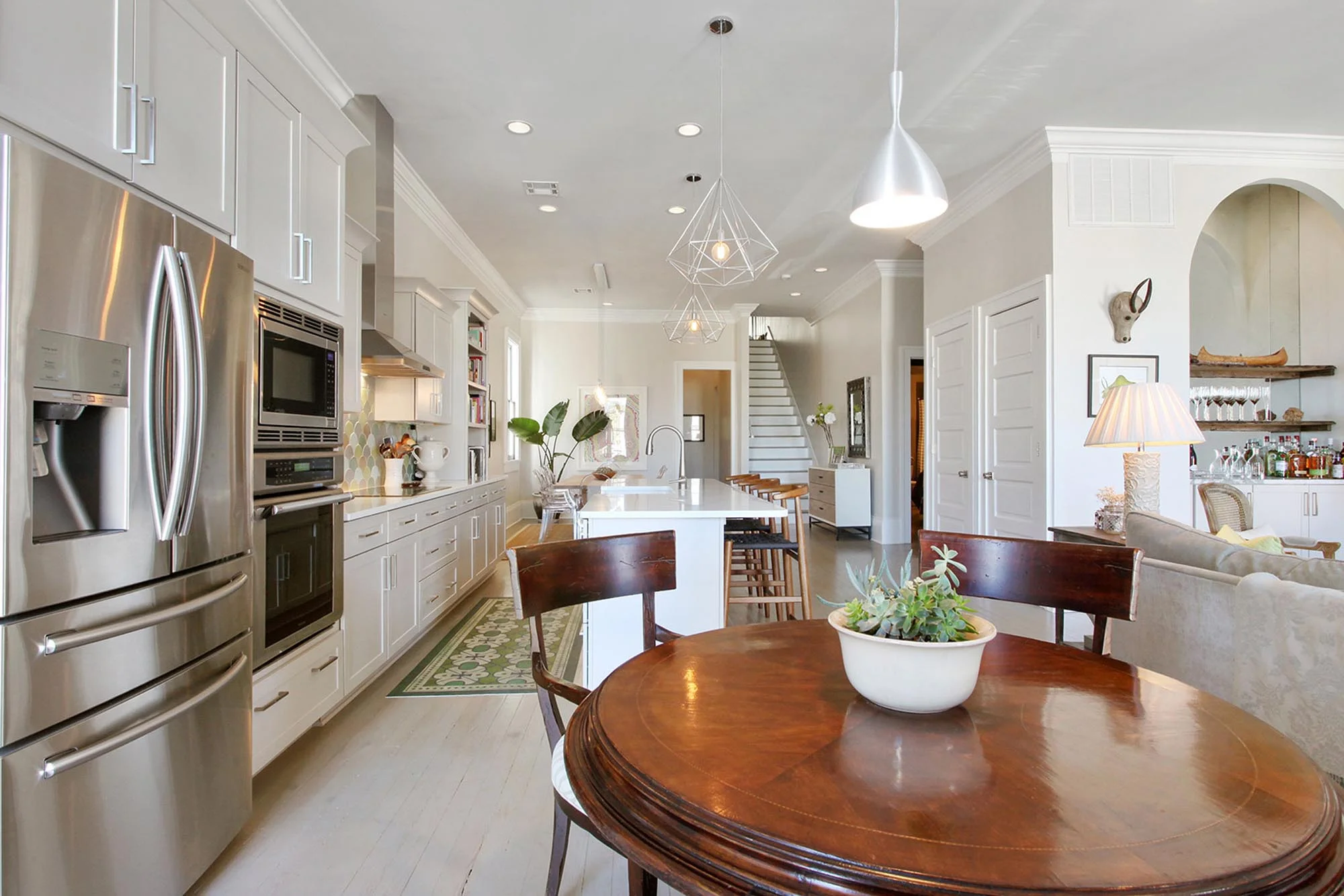 Breakfast nook and kitchen areas with modern appliances