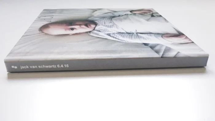 You can put any title you want on the spine. We chose his birthday and full name. 