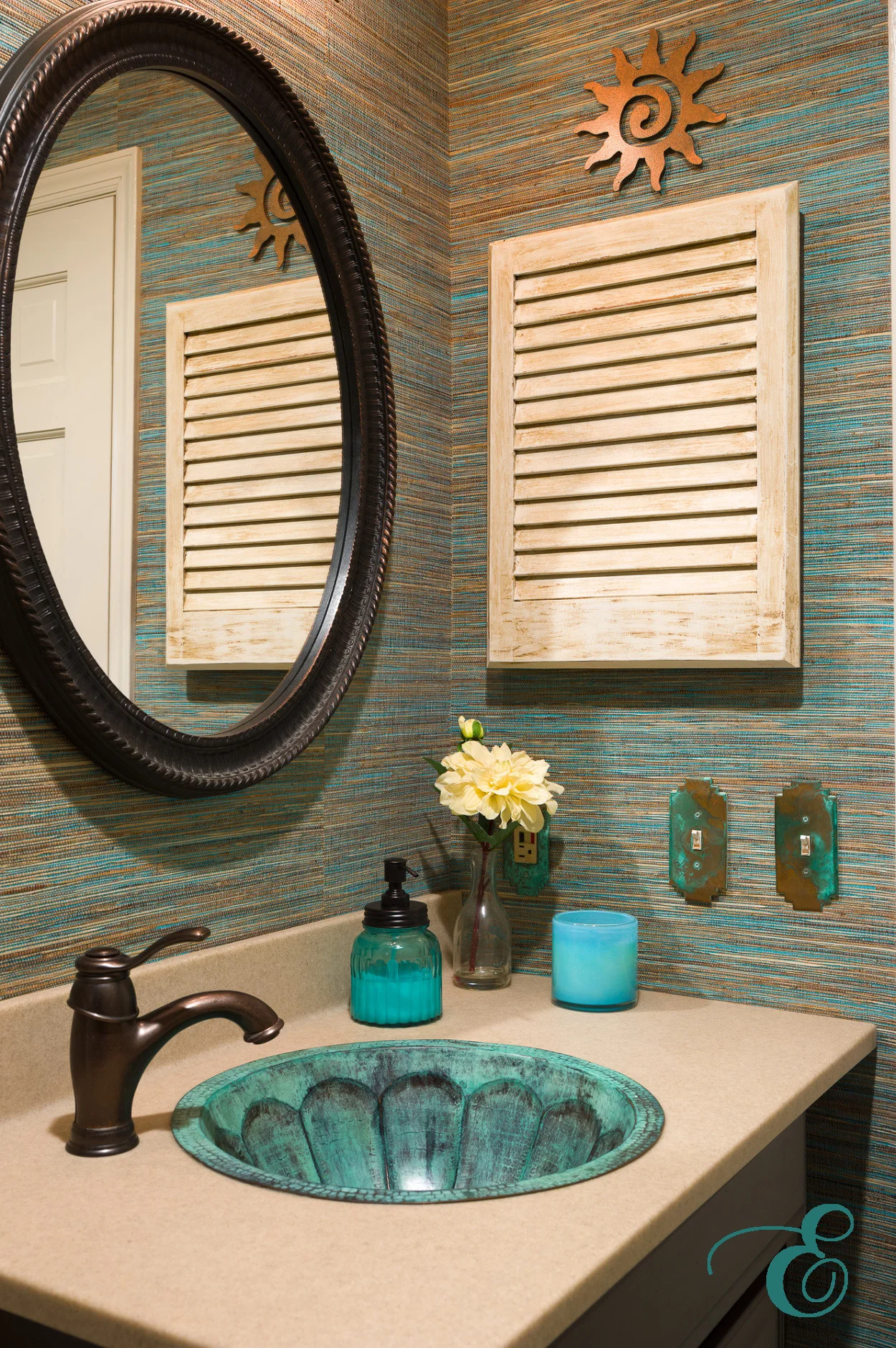 Southwestern powder room with grasscloth wallpaper and a custom sink