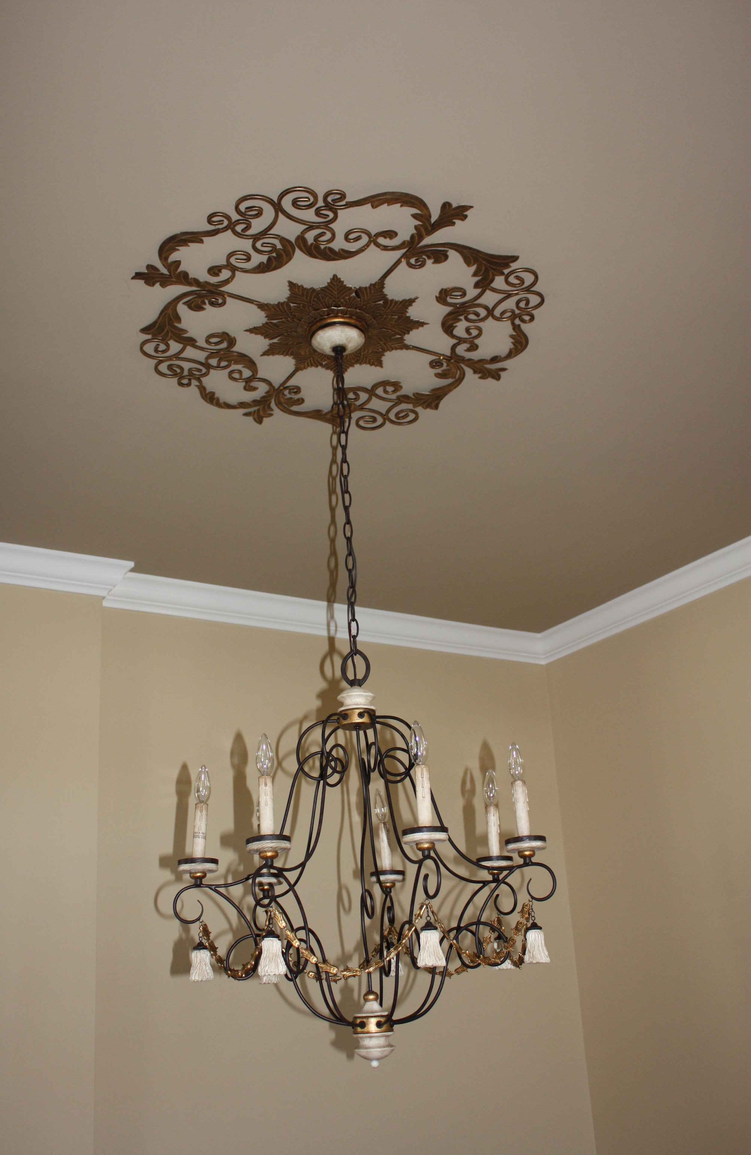Custom details like this beautiful ceiling medallion elevate your space. 