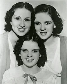 Garland with her sisters