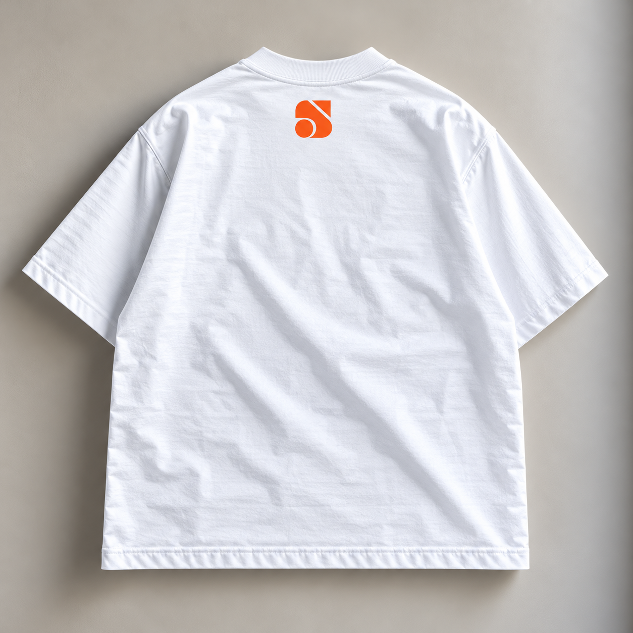 White T-Shirt with Orange Geometric Logo.png